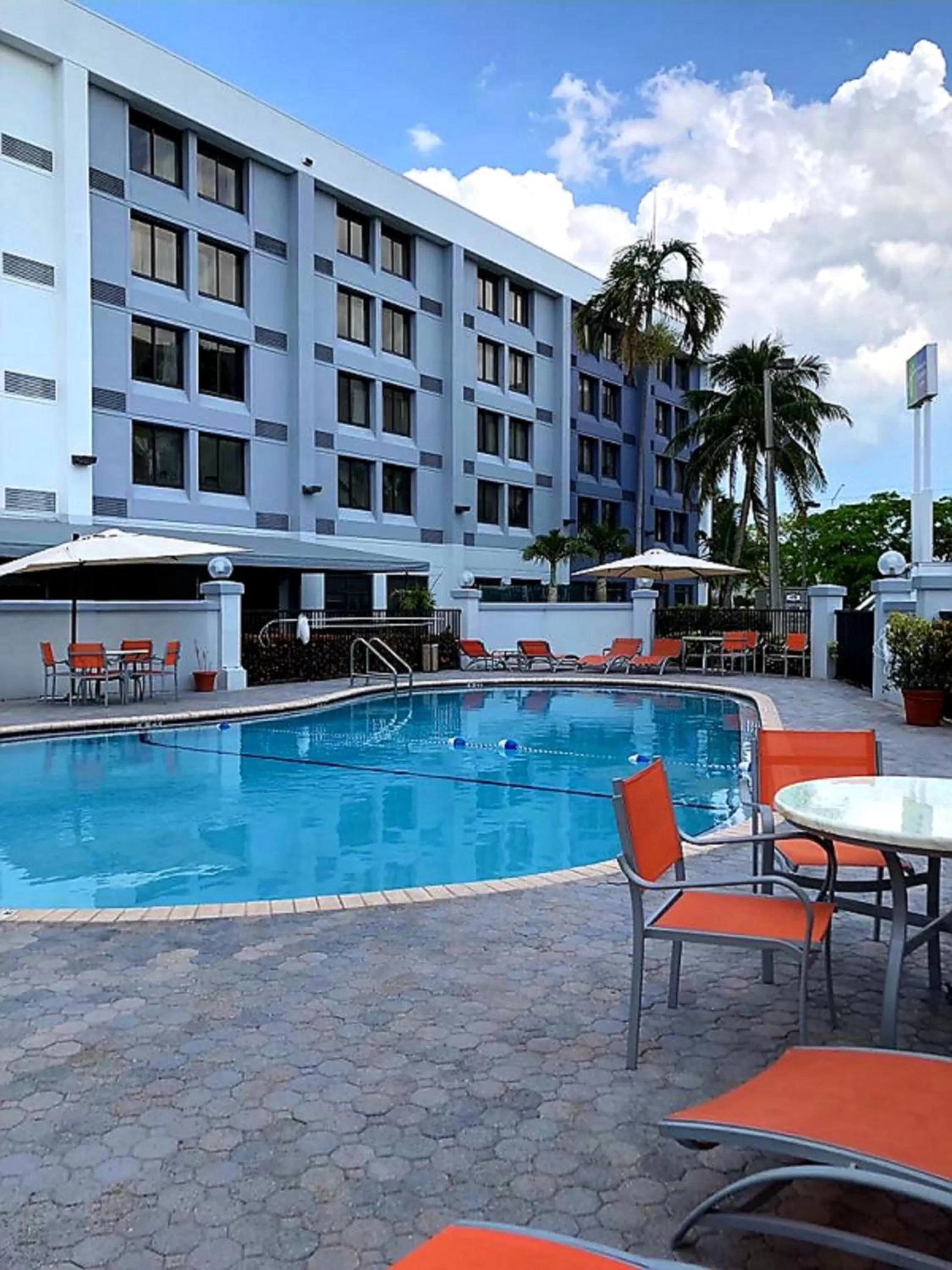 Swimming pool in Holiday Inn Express & Suites Miami - Hialeah by IHG