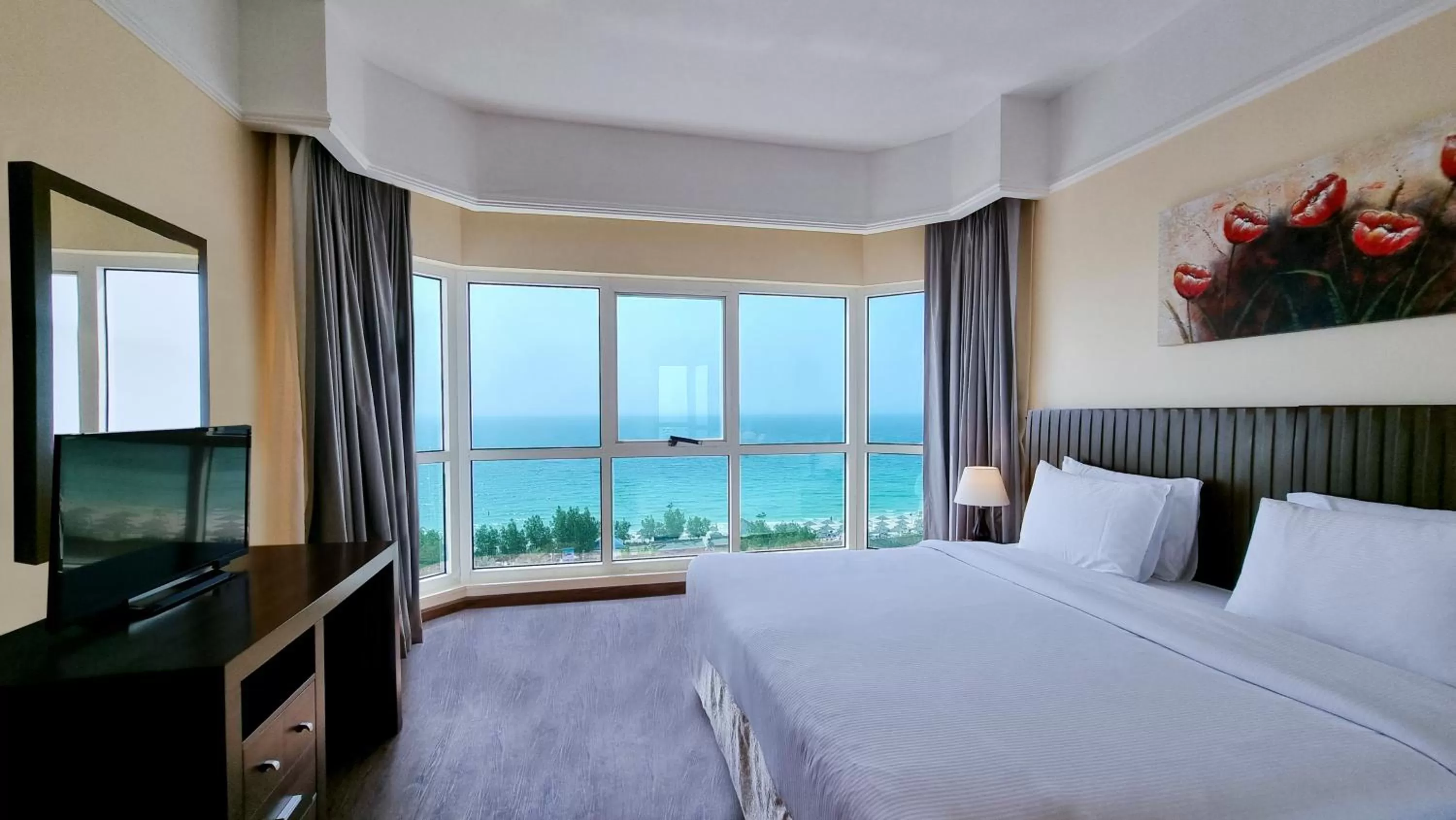 Bedroom, Bed in Ramada by Wyndham Beach Hotel Ajman