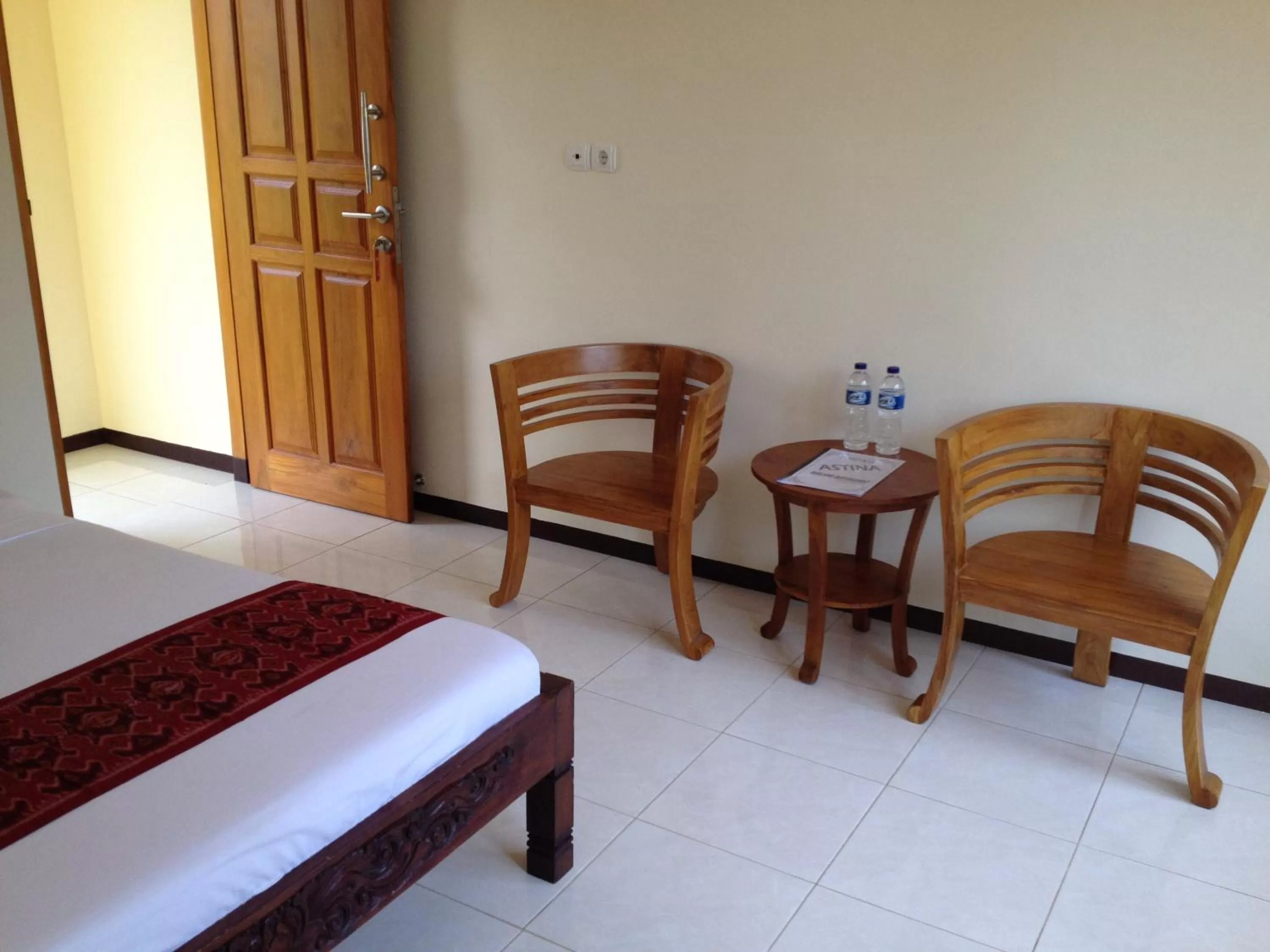 Bedroom, Seating Area in Astina Hotel