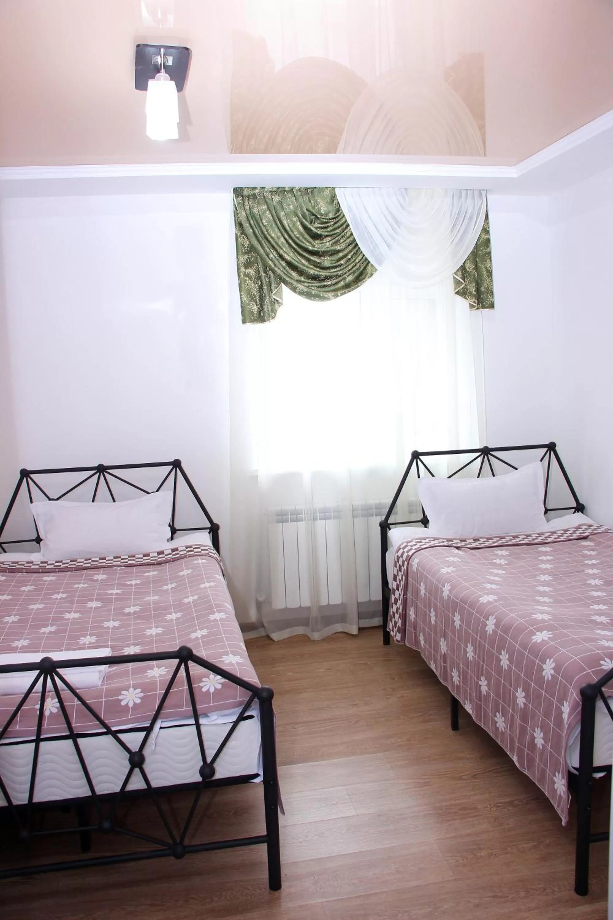 Bed in Zhaylau Hotel