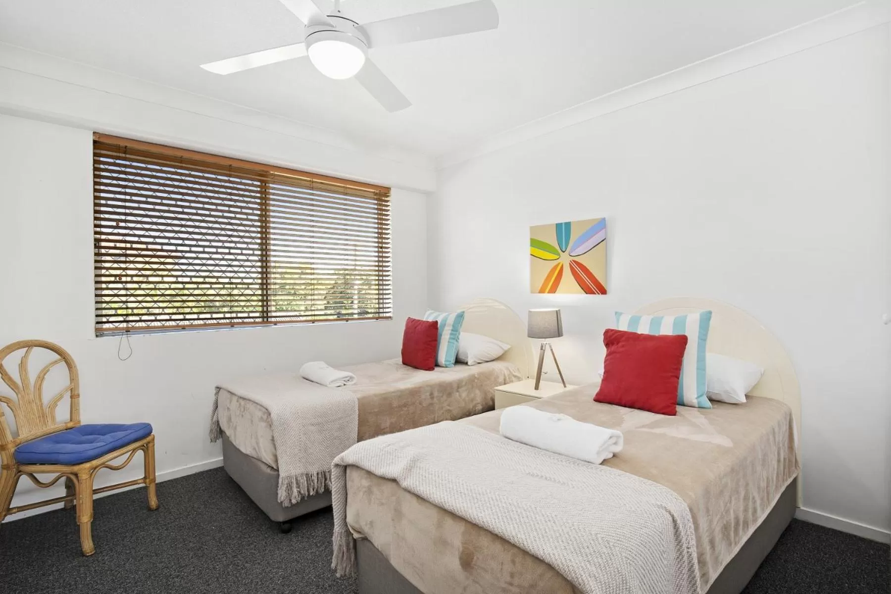 Bed in Kirra Palms Holiday Apartments