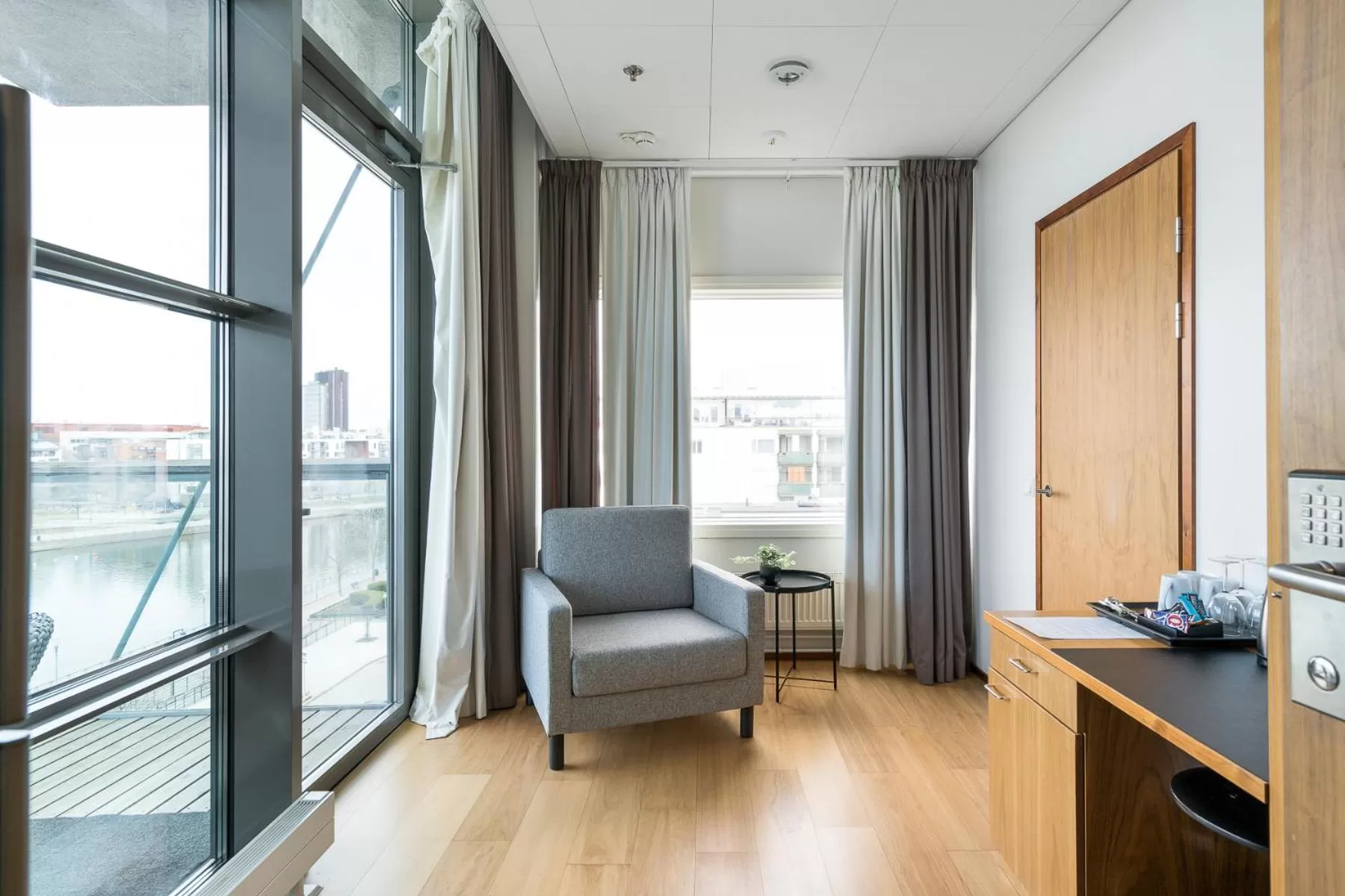 Seating area in Hiisi Hotel Helsinki Jätkäsaari