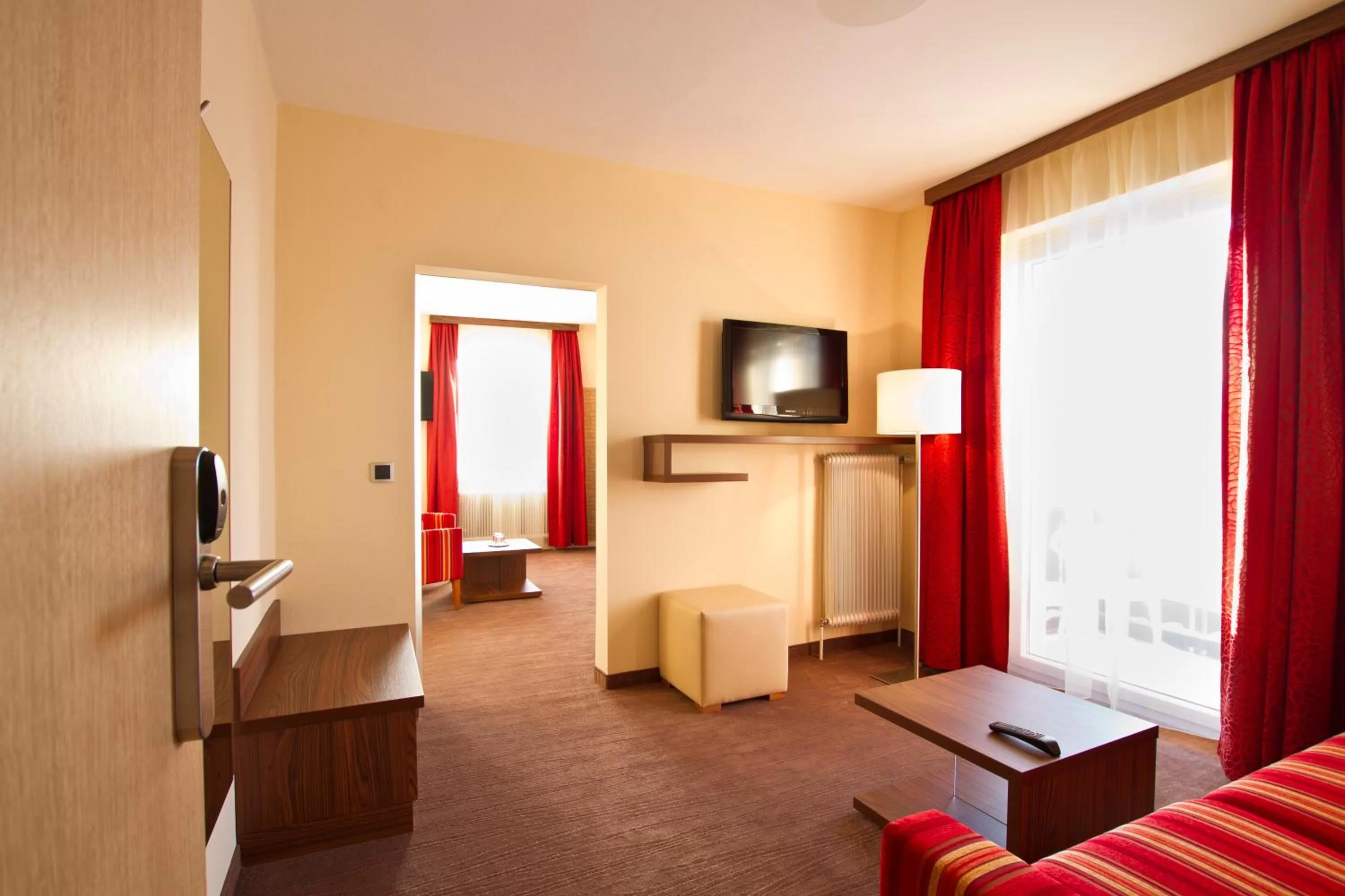 Photo of the whole room, TV/Entertainment Center in SCHÖNIS-Landhotel