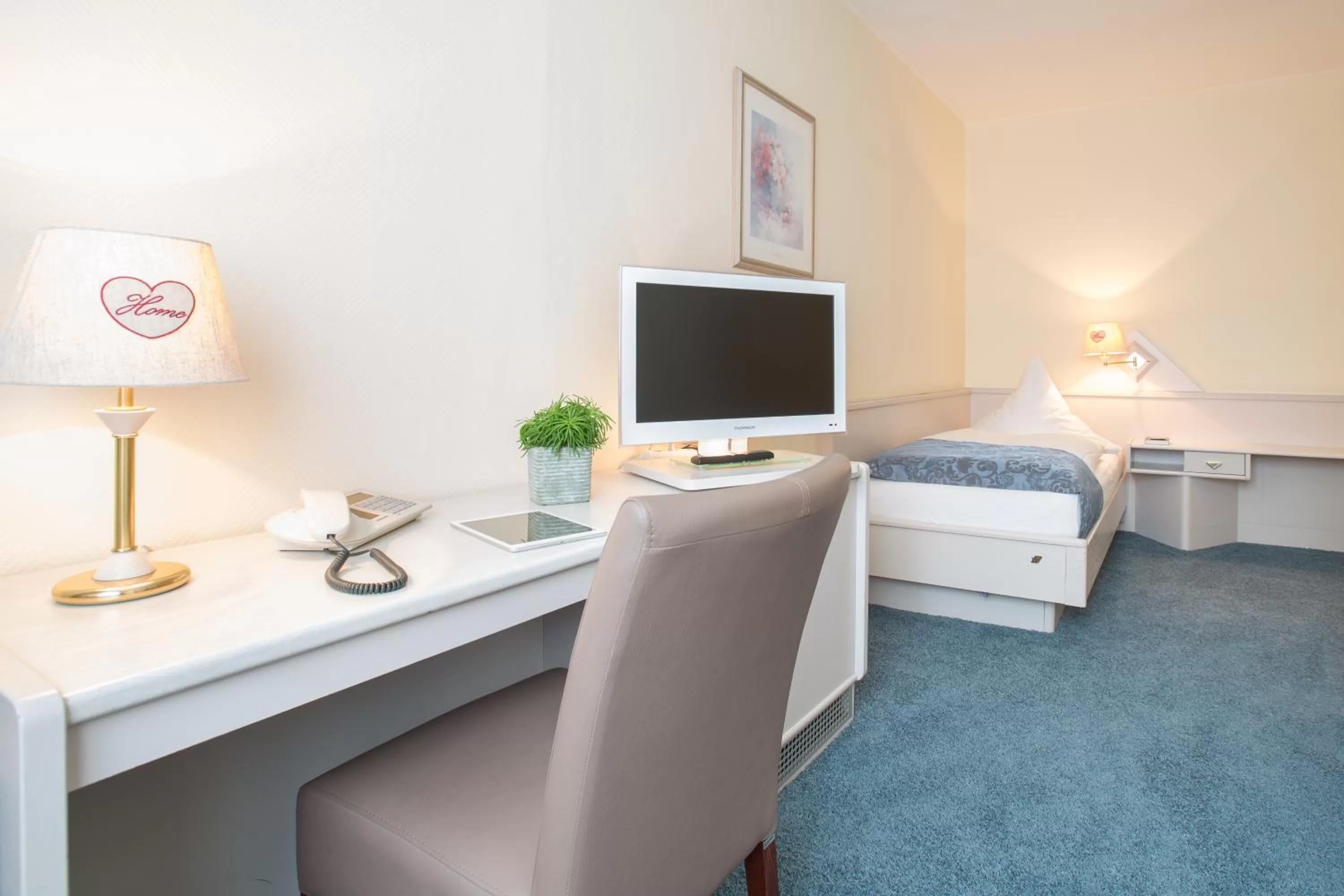 Seating area, Bed in Hotel Kristall