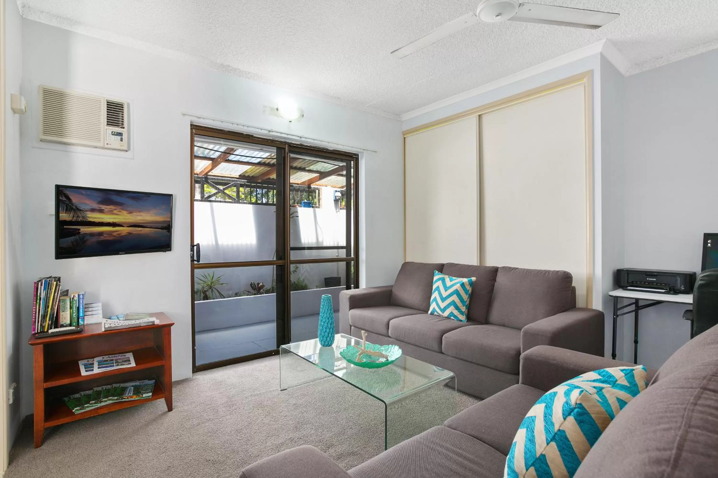 Communal lounge/ TV room in Cairns City Palms