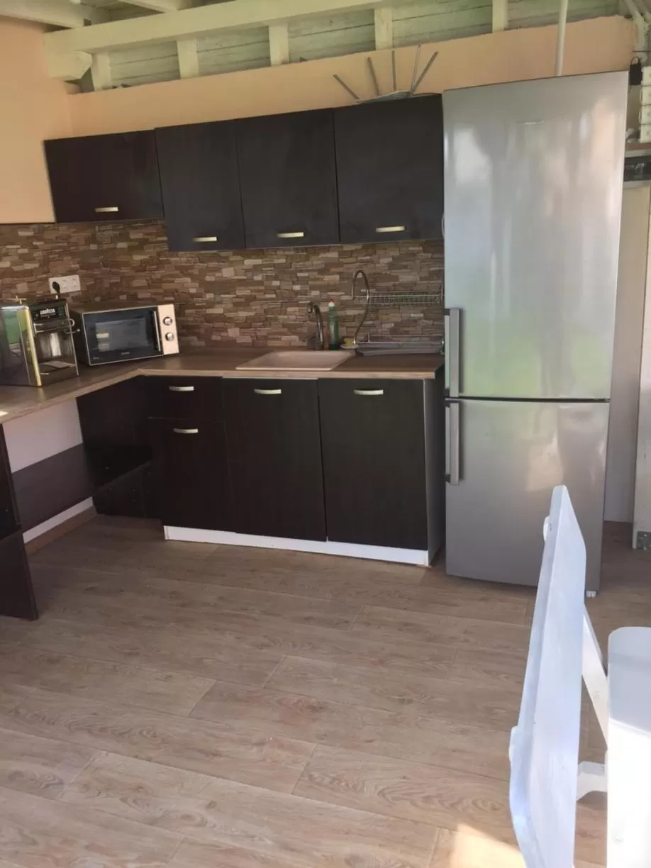 Kitchen/Kitchenette in Family Hotel Malibu