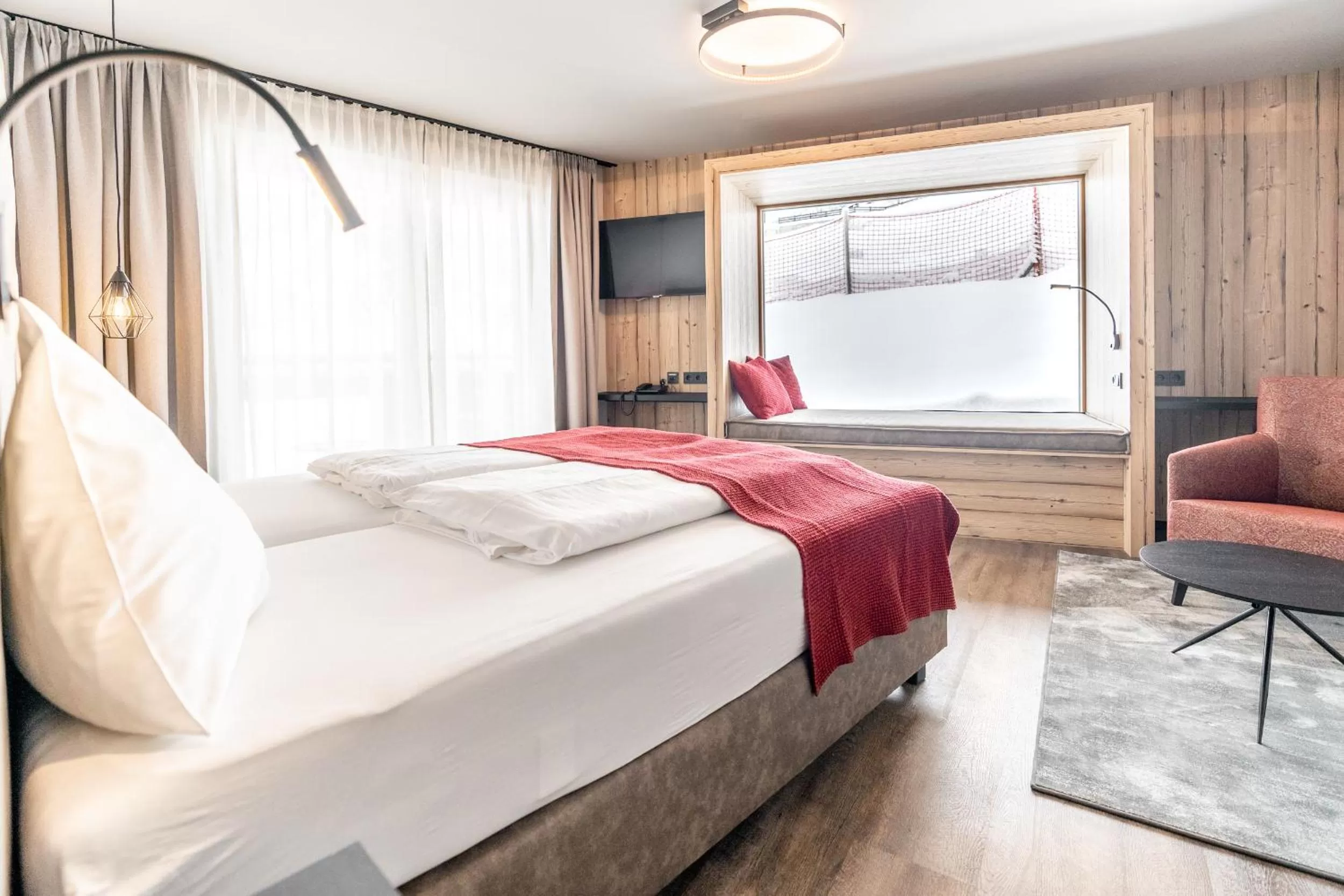 Bed in Hotel Astrid - Ski In - Ski Out