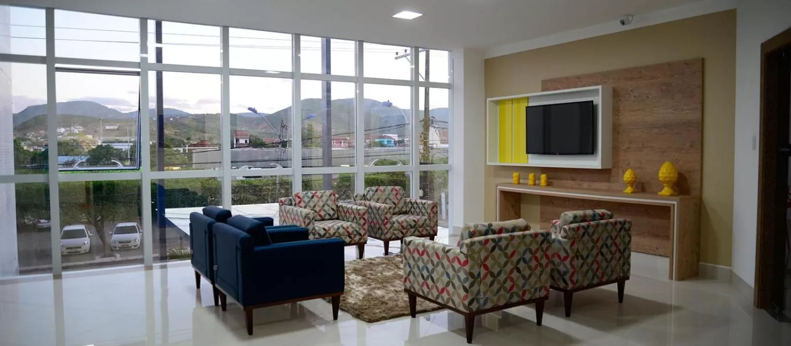 Communal lounge/ TV room, Seating Area in Granterrara Hotel