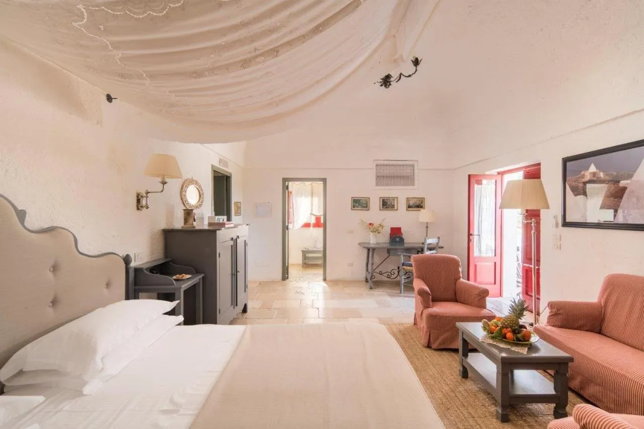 Photo of the whole room, Bed in Masseria Torre Coccaro