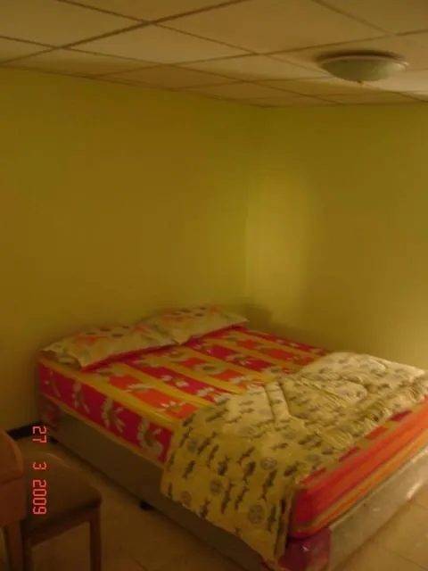 Bed in Kaset Guesthouse