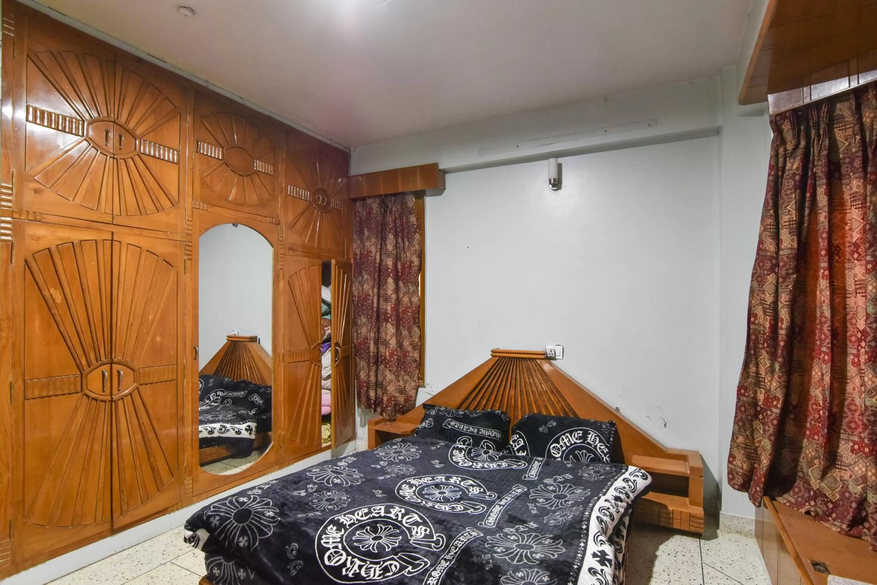 Bathroom, Bed in Dhanlaxmi Apartments