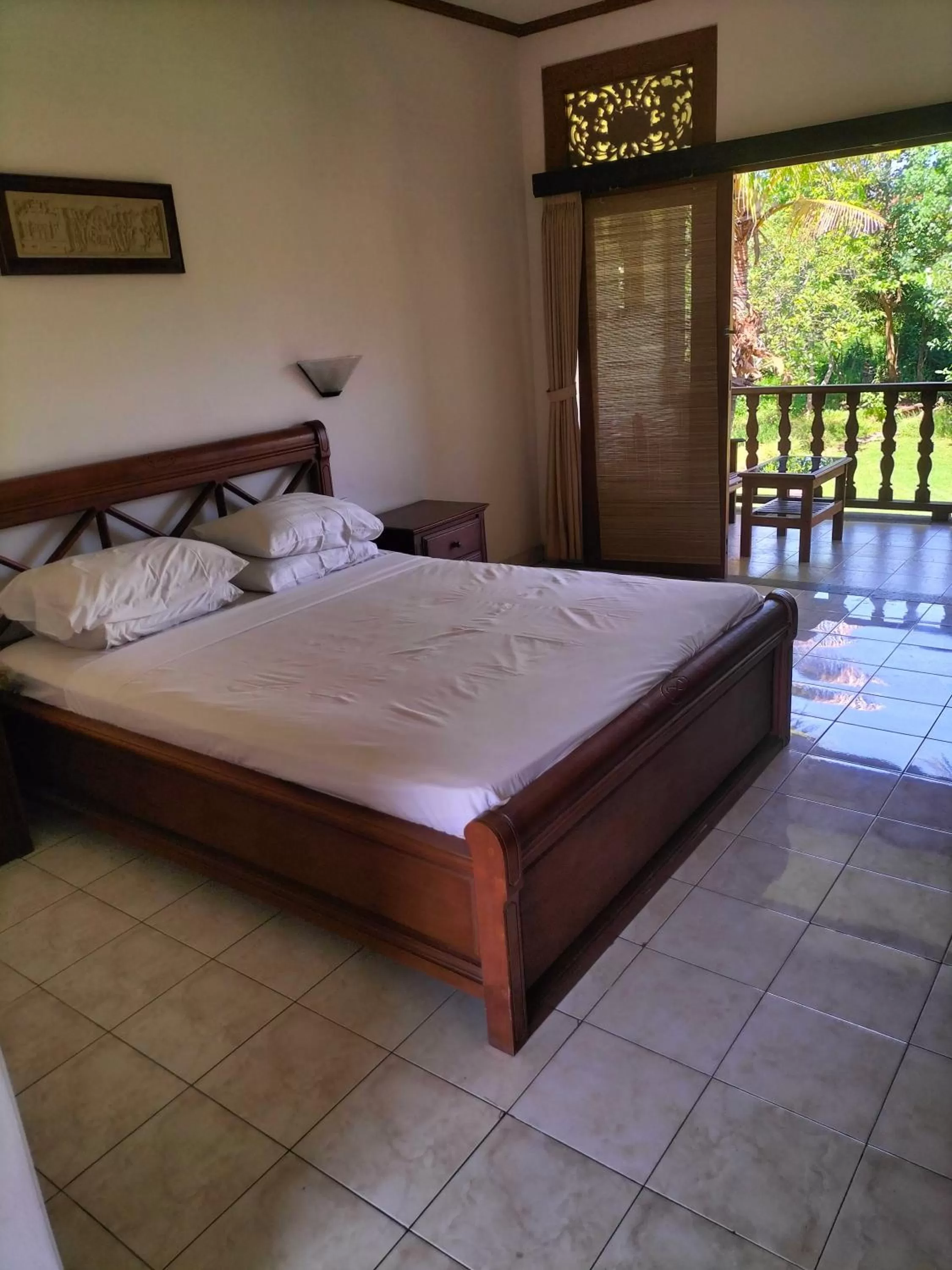 Bed in Nirwana Sea Side Cottages