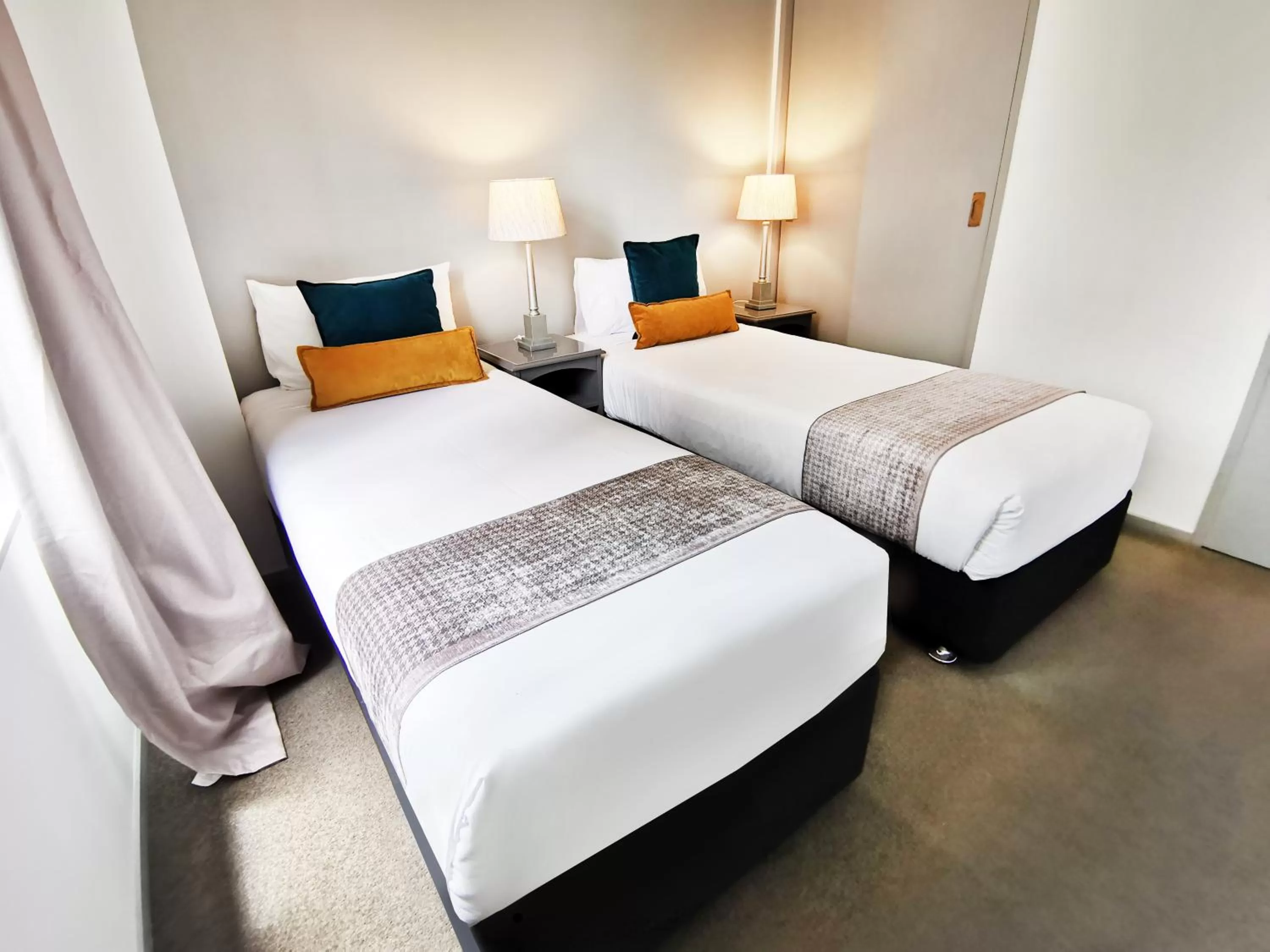 Bed in Quest on Eden Auckland CBD Apartment Hotel