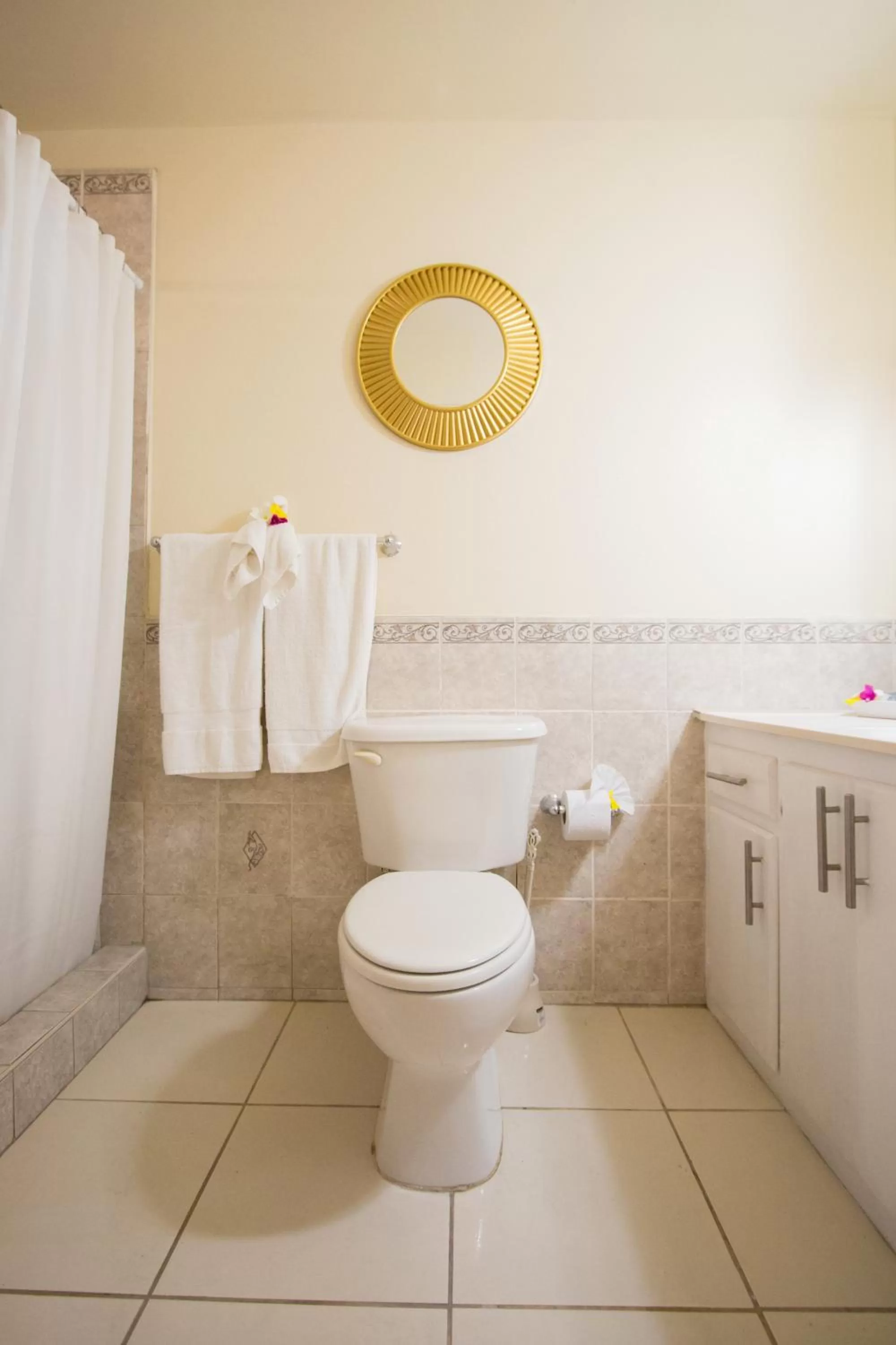 Toilet in Connie's Comfort Suites