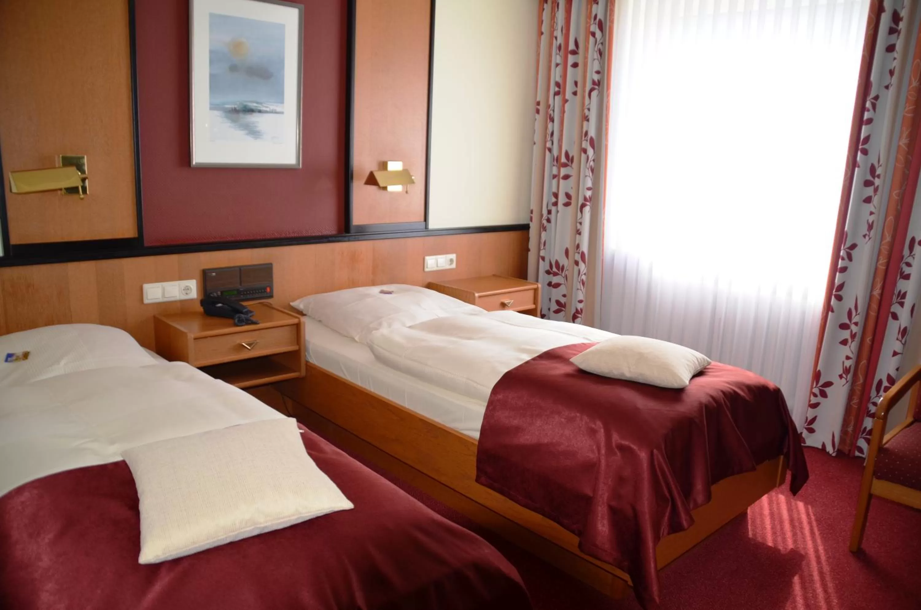 Bed in Hotel Exquisit