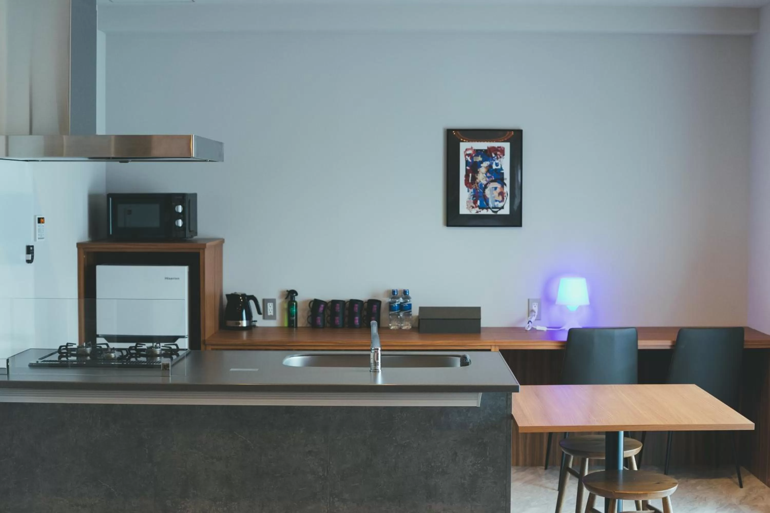 Kitchen or kitchenette in Liberated HOTEL Haruyoshi Kaichi