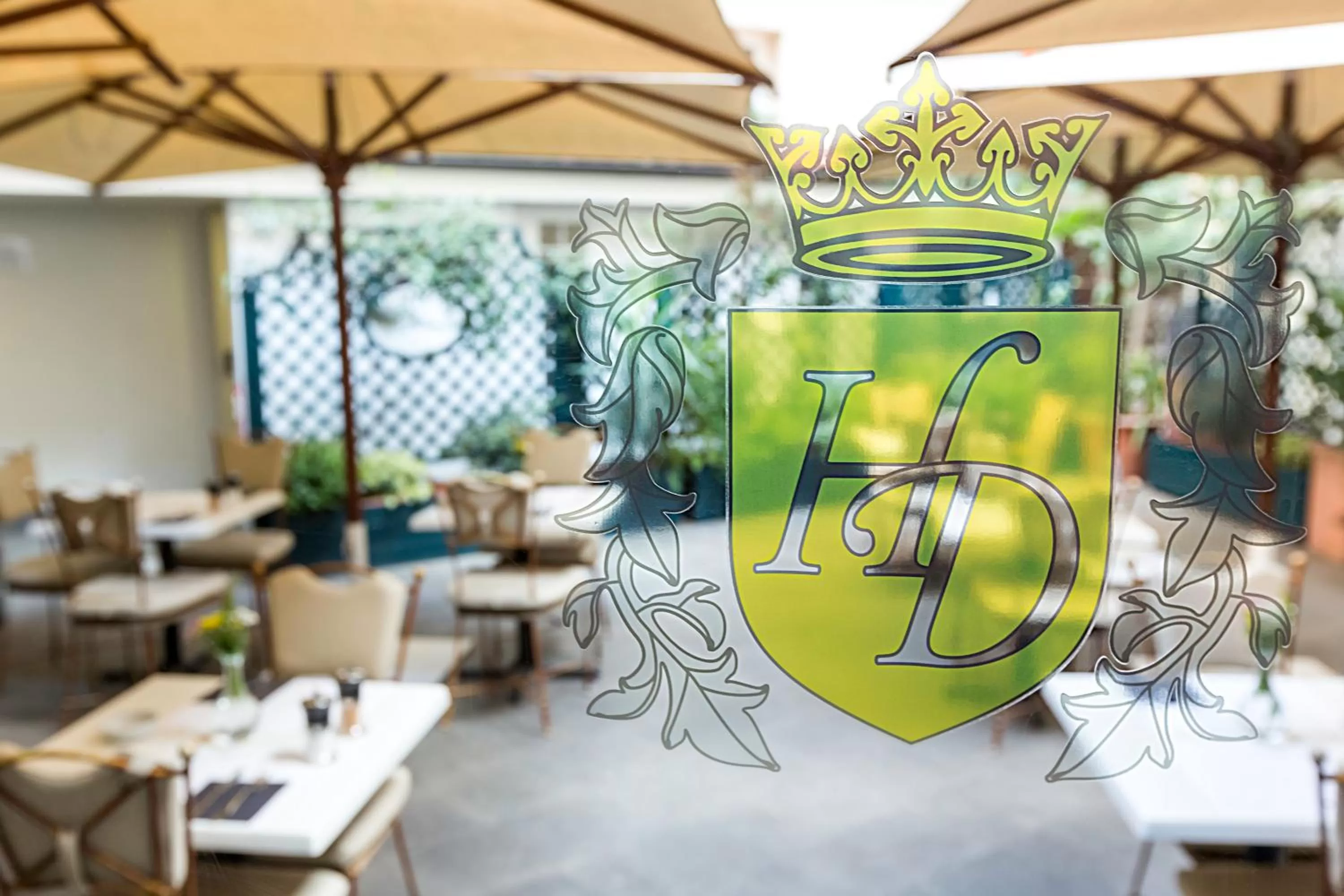 Property logo or sign in Hotel Diplomatic