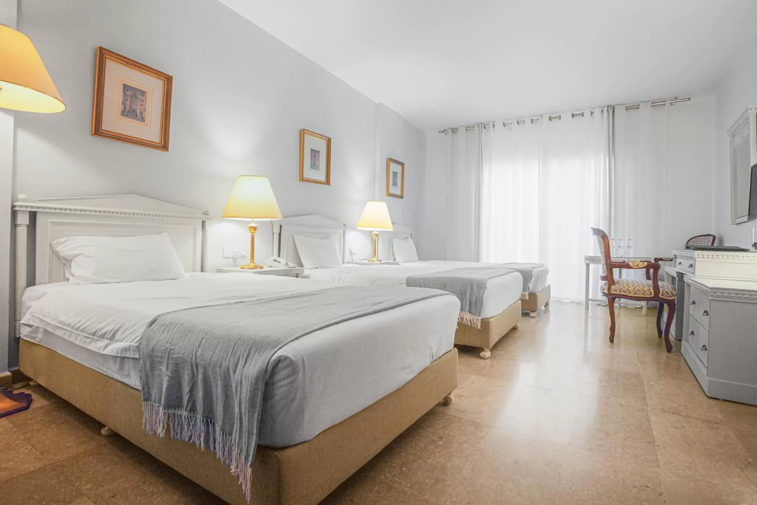 Deluxe Triple Room in Grand Hotel Madaba Deluxe Triple Room in Grand Hotel Madaba