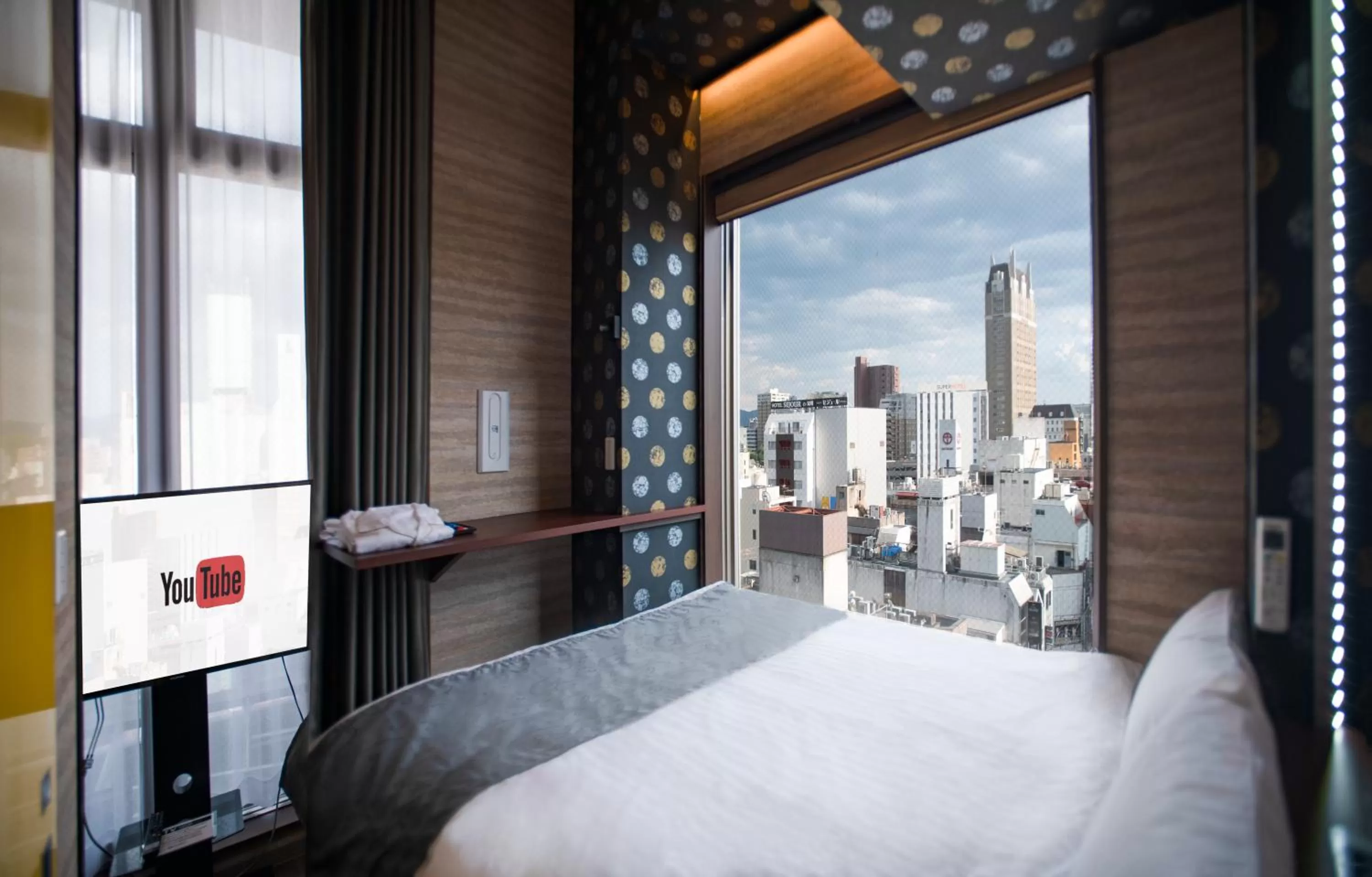 Bed in Pinpon Hotel Hiroshima