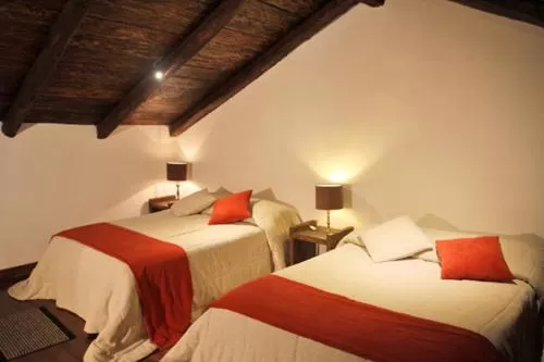 Bed in Hacienda Hostería Dos Chorreras