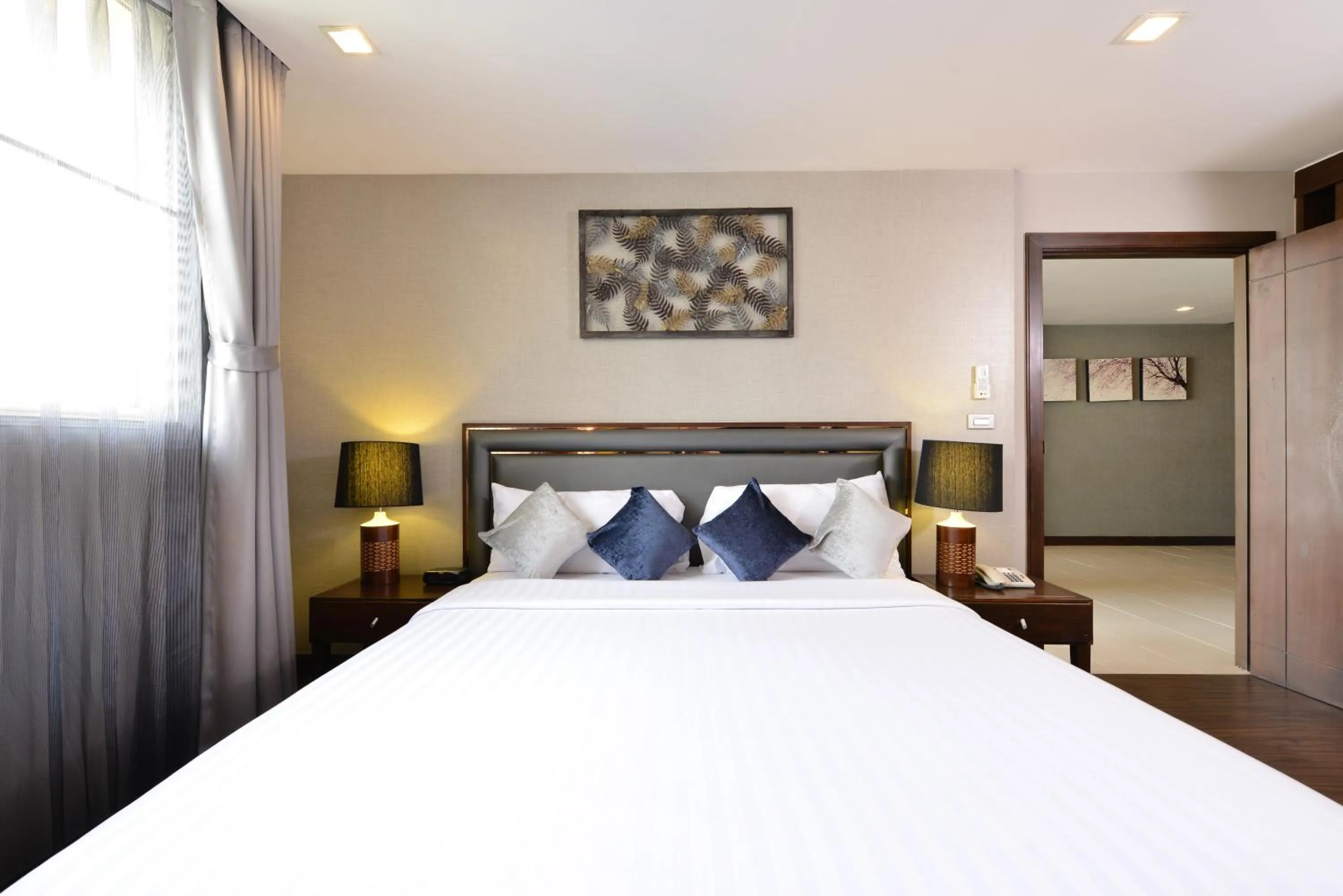 Bed in Grand Mercure Bangkok Asoke Residence