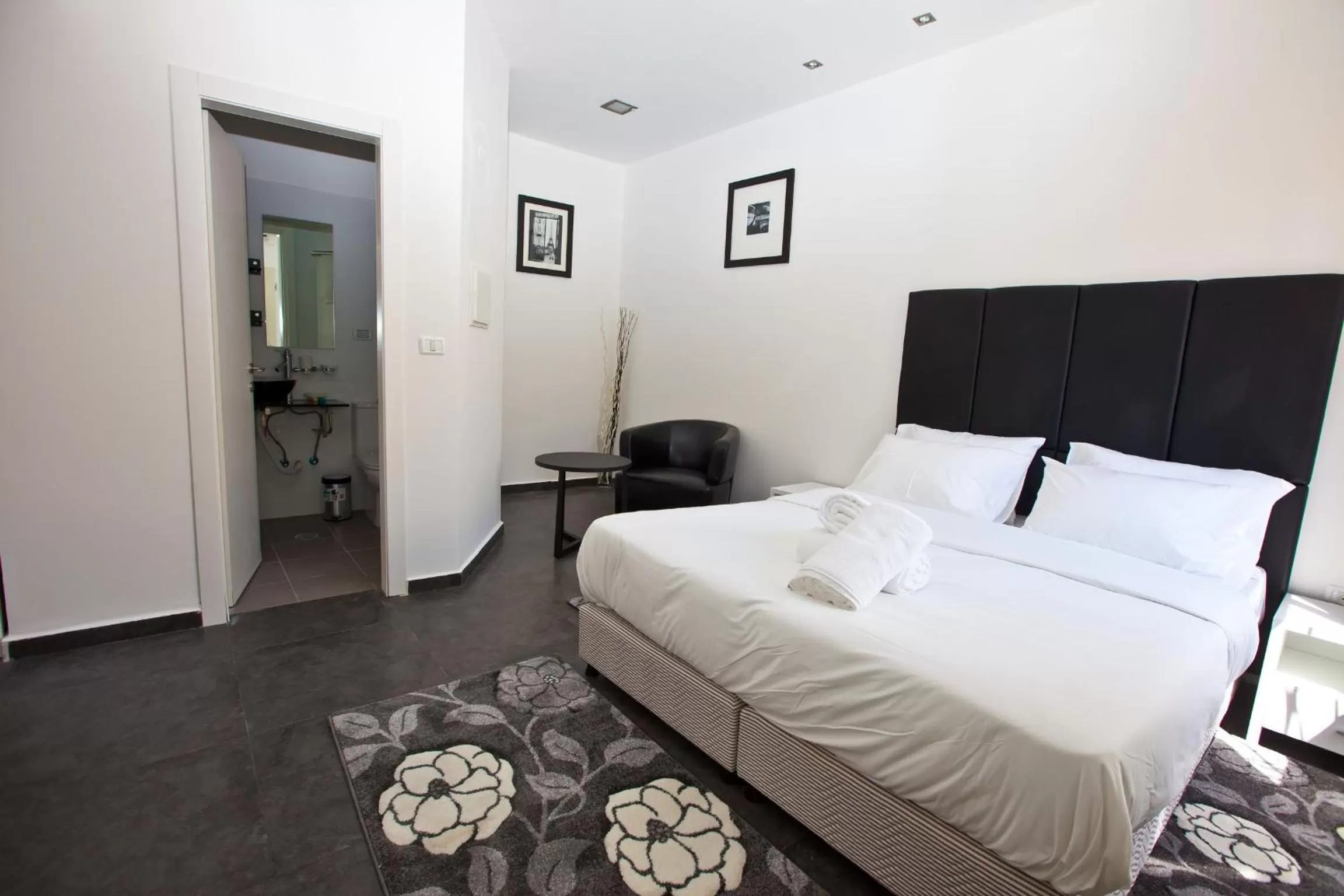 Photo of the whole room, Bed in Geula Suites BY RAPHAEL HOTELS