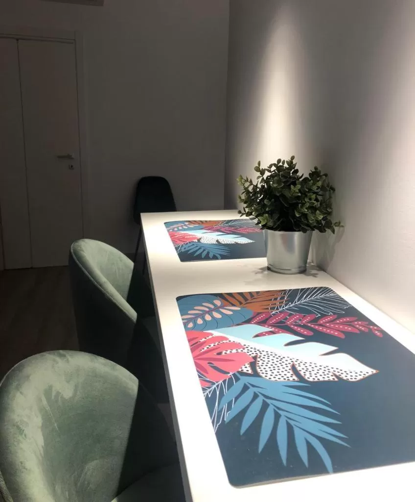 Seating area, Bed in Narciso boutique apartment