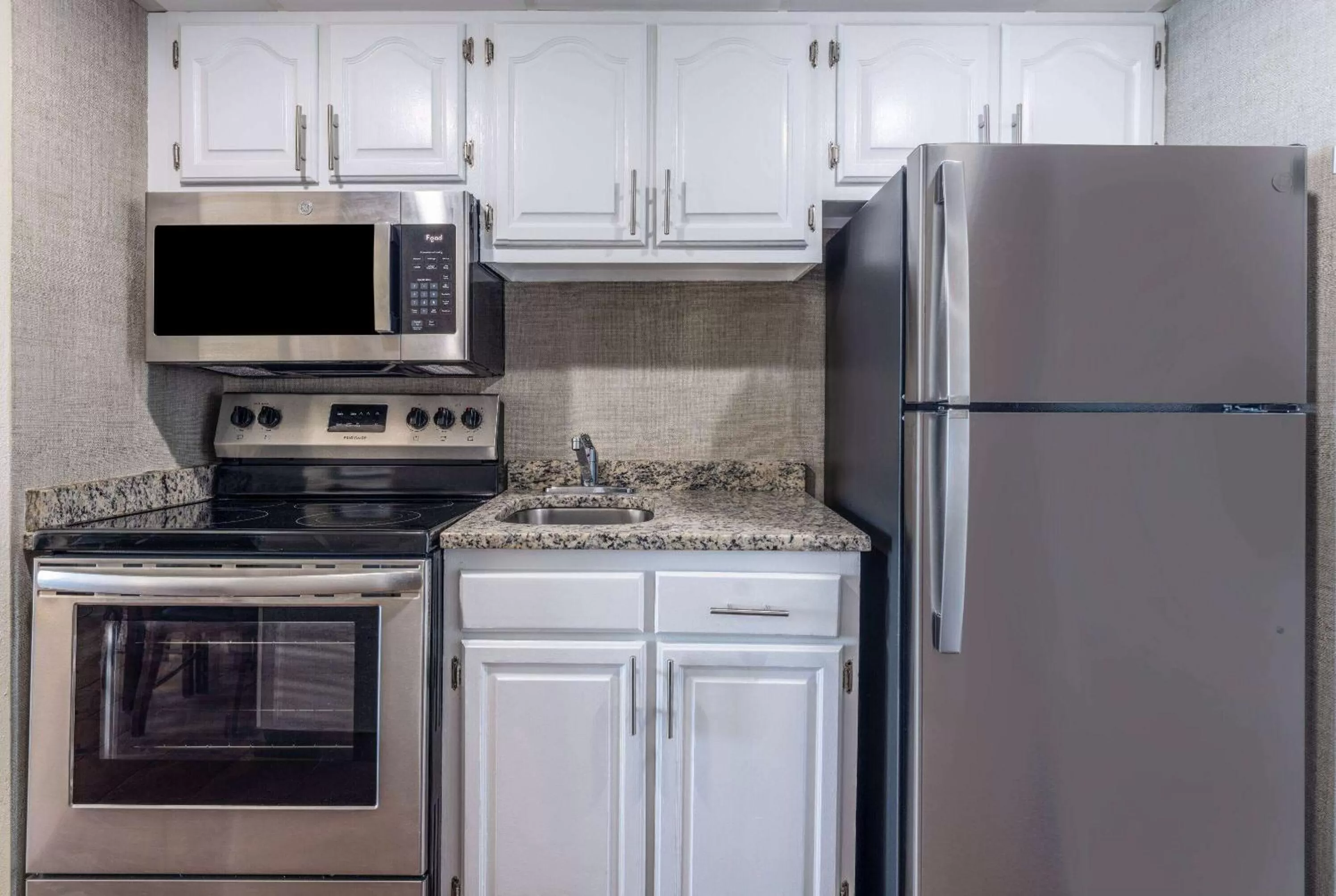 Kitchen or kitchenette in The Sandbar Hotel, Trademark Collection by Wyndham