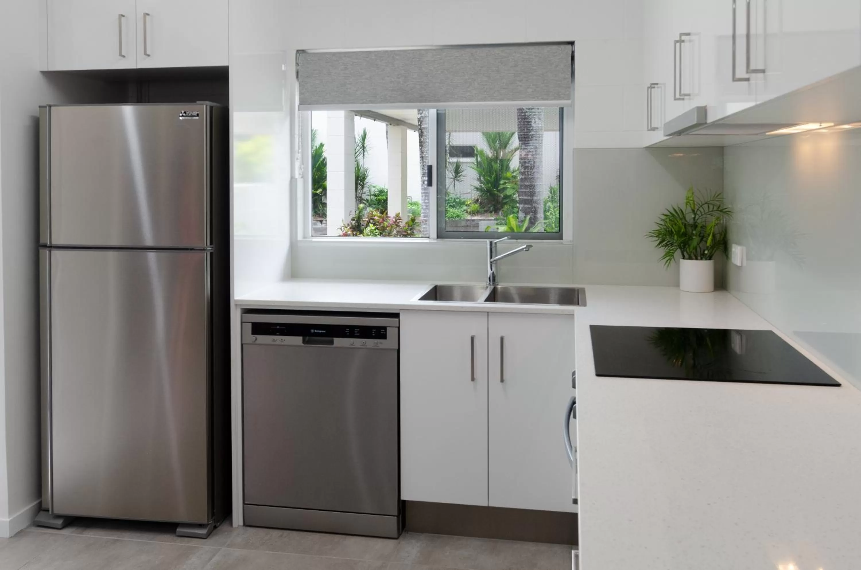 Kitchen/Kitchenette in TiTree Village Holiday Apartments