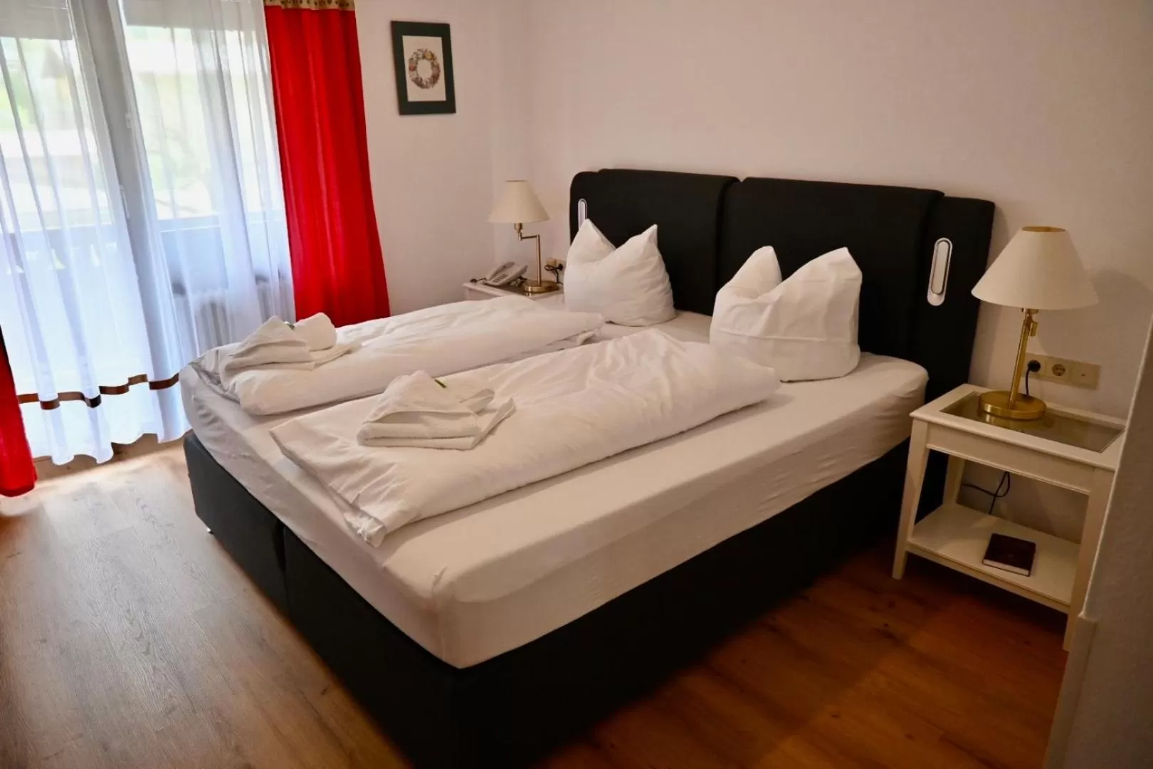 Photo of the whole room, Bed in Hotel Am Rupertuspark