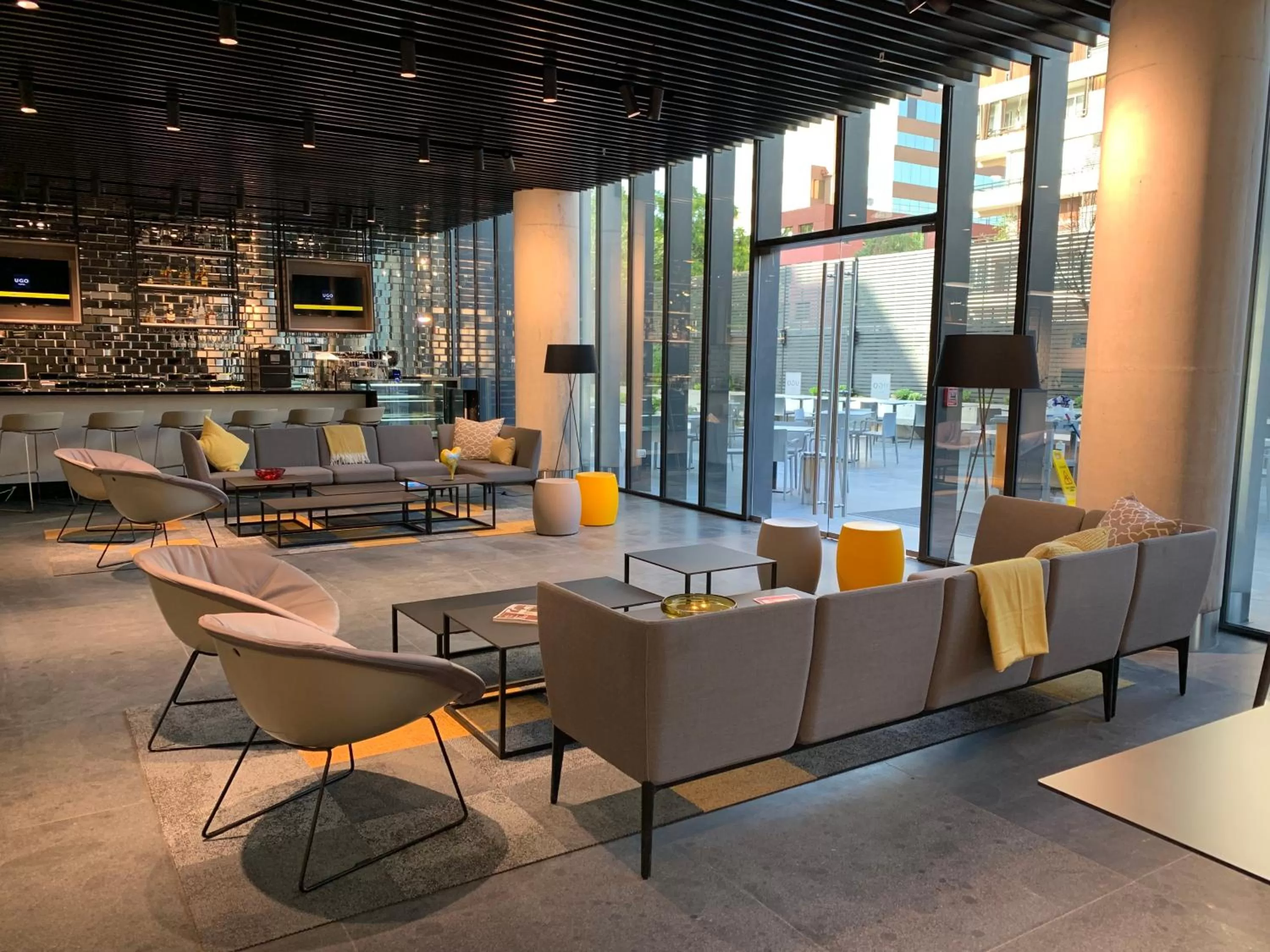 Communal lounge/ TV room in Ola Santiago Providencia, Tapestry Collection by Hilton