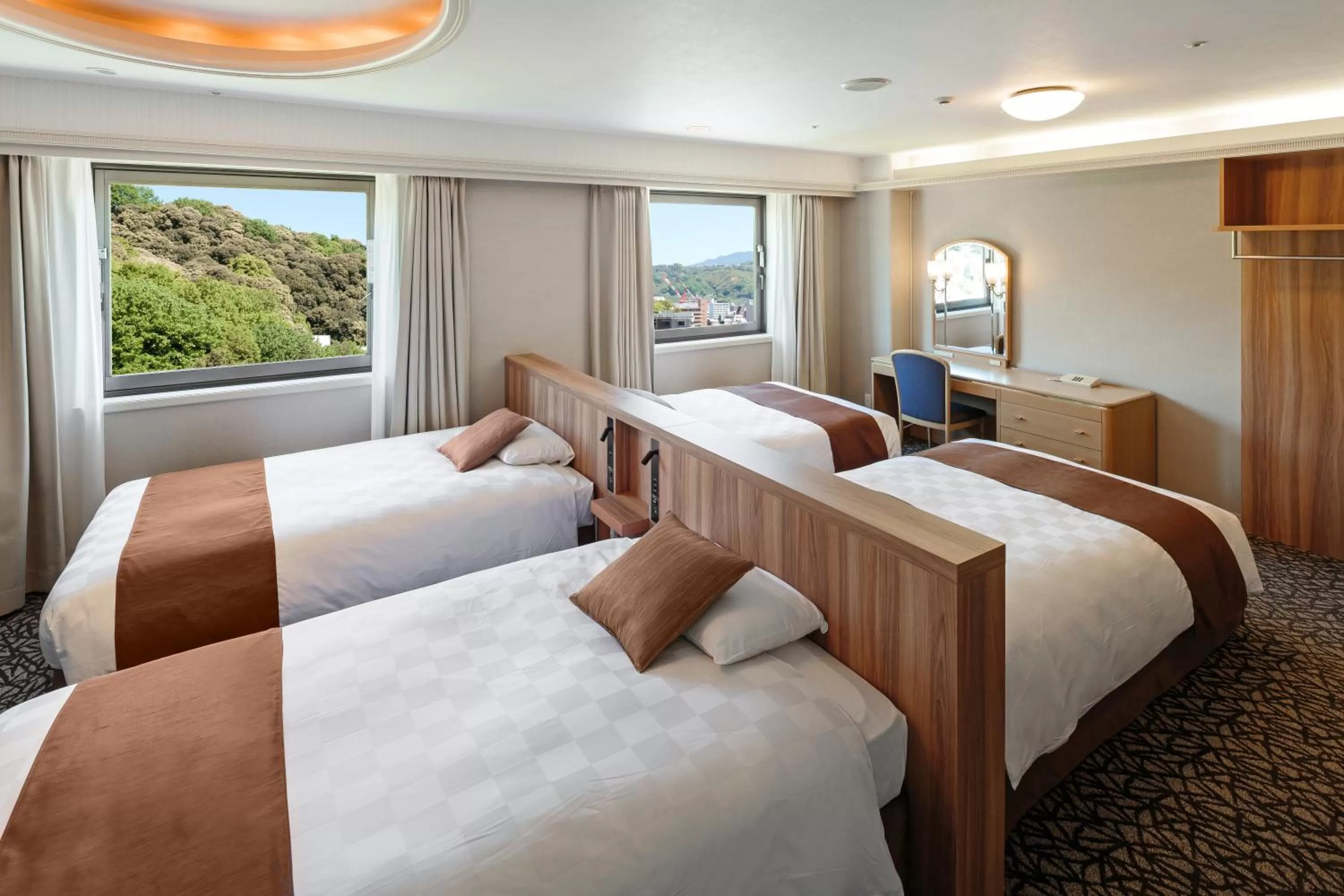 Decorative detail, Bed in Matsuyama Tokyu REI Hotel