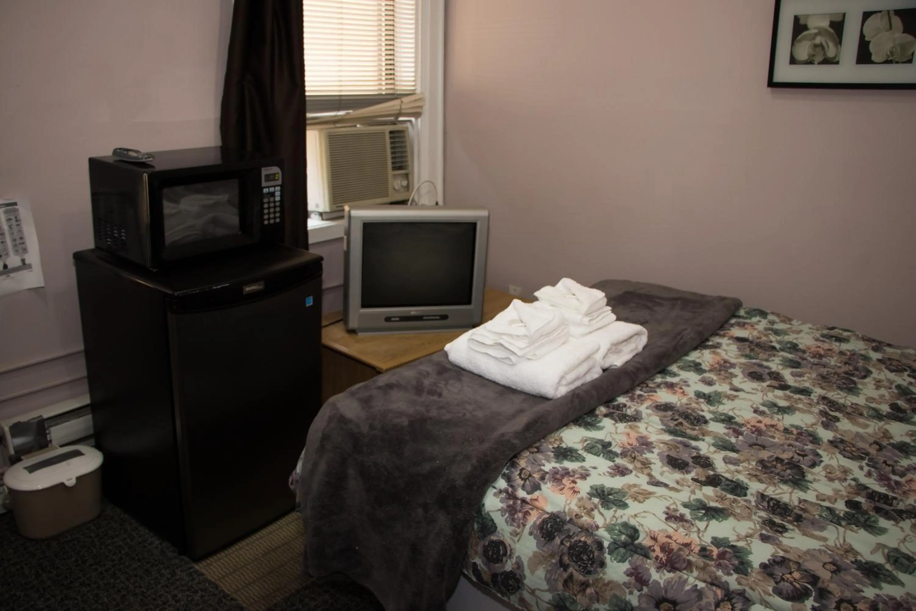 Bed in Saint Lawrence Residences and Suites