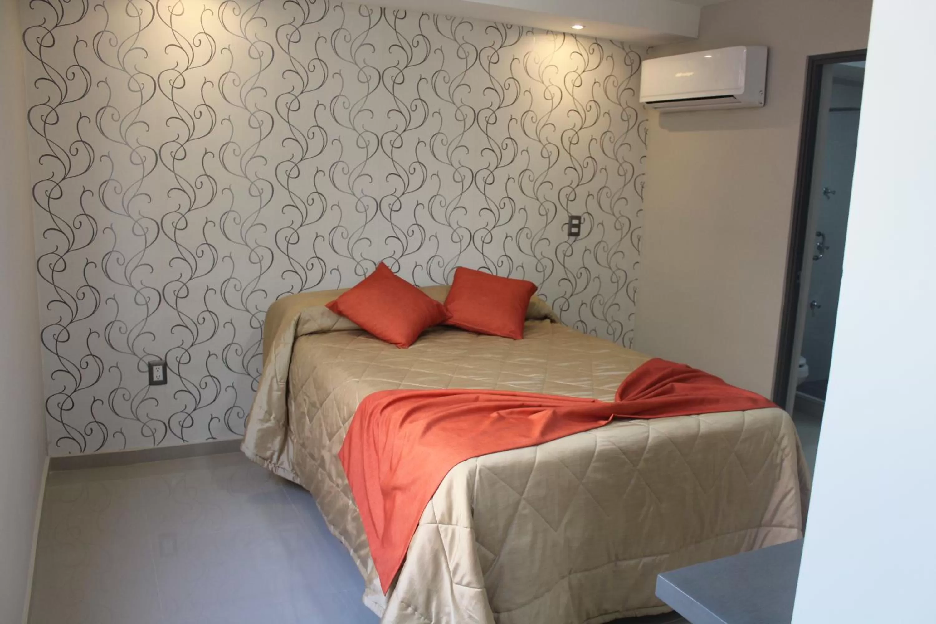 Bedroom in Suites San Luis