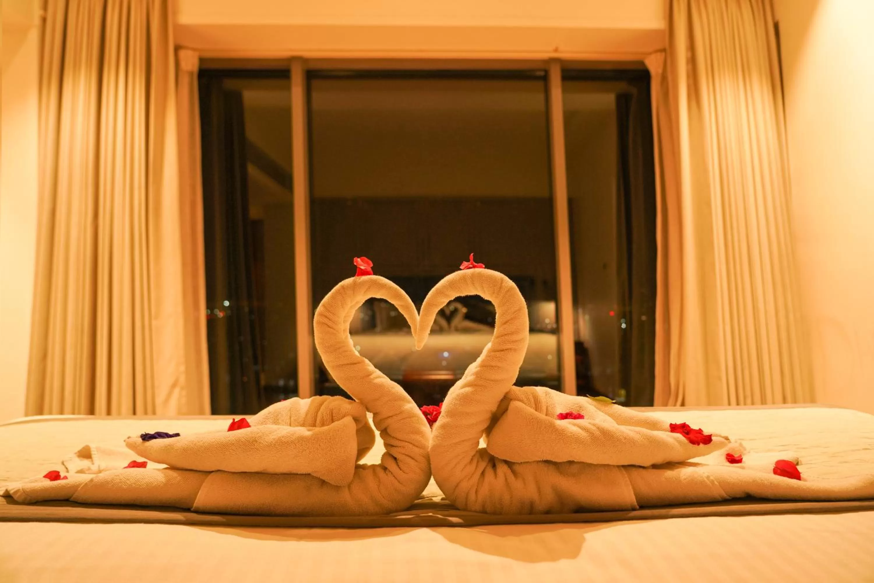 Bed in Pride Hotel Udaipur