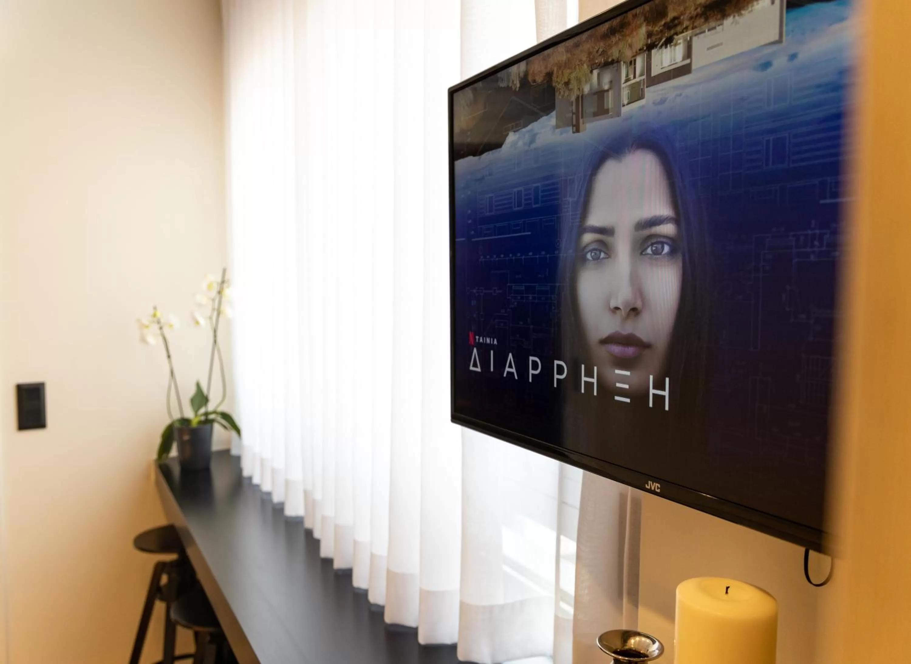 Decorative detail, TV/Entertainment Center in Triple A - Apartments Accommodation in Prime Location (Between Monastiraki & Syntagma Square)