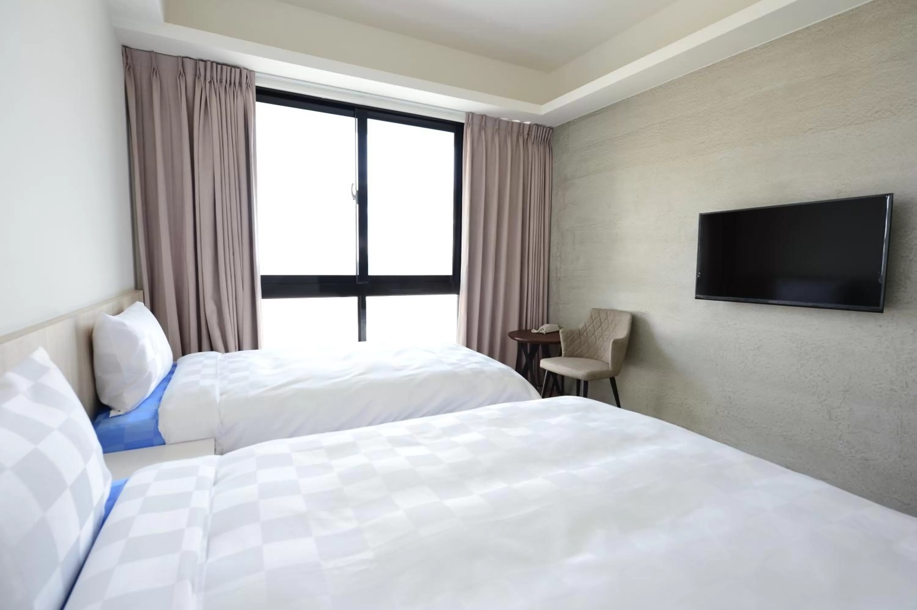 Bed in Sky Square Business Travel