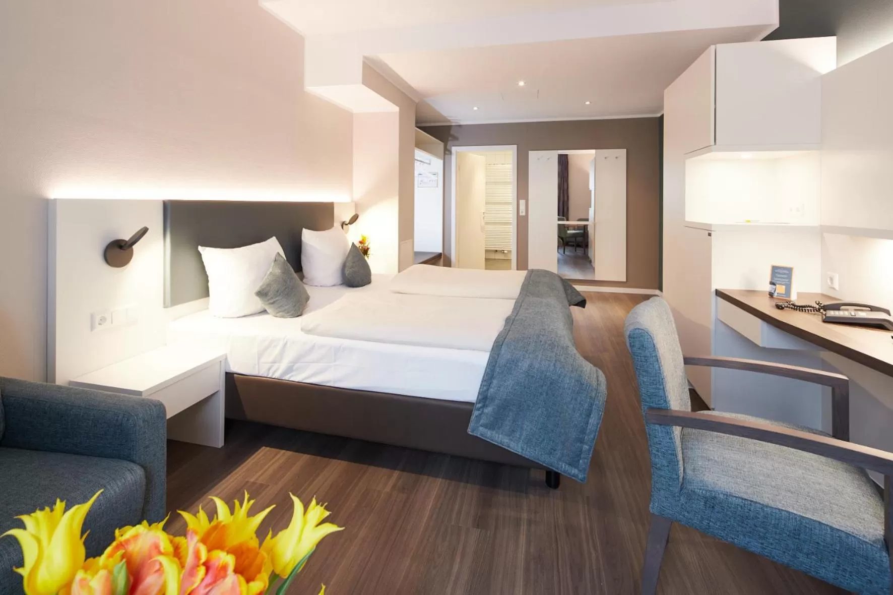 Photo of the whole room, Bed in Stadthotel Freiburg Kolping Hotels & Resorts