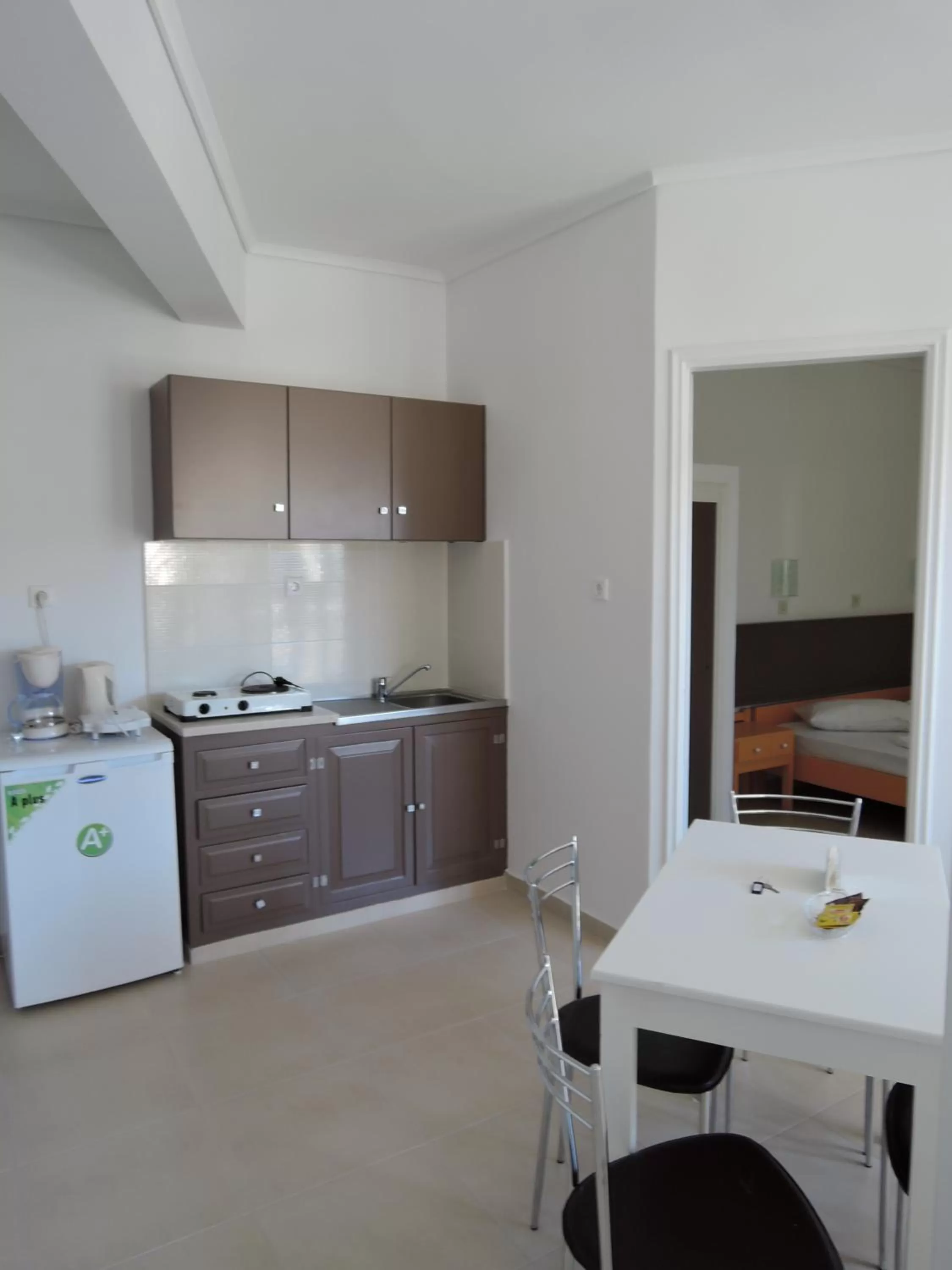 Kitchen or kitchenette in Fantasia Hotel Apartments