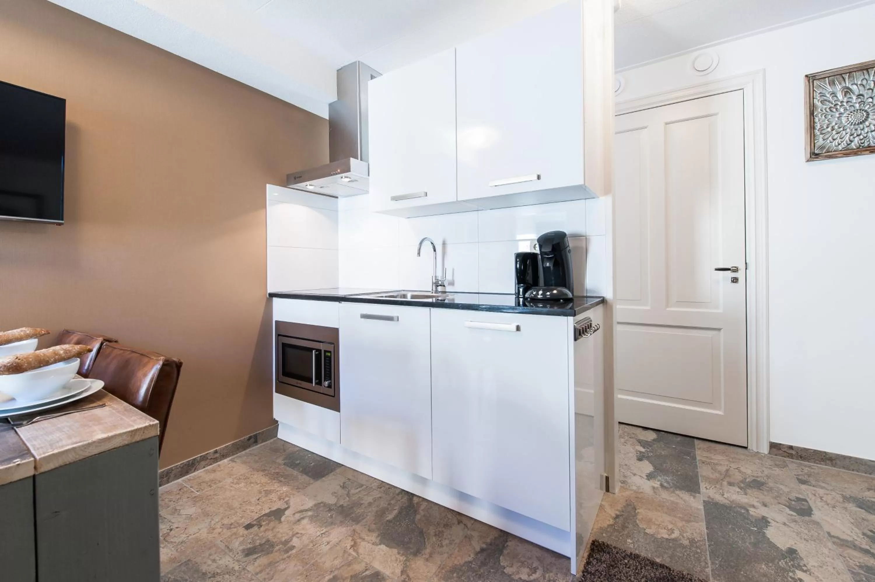Kitchen or kitchenette in Plantage Garden Apartments
