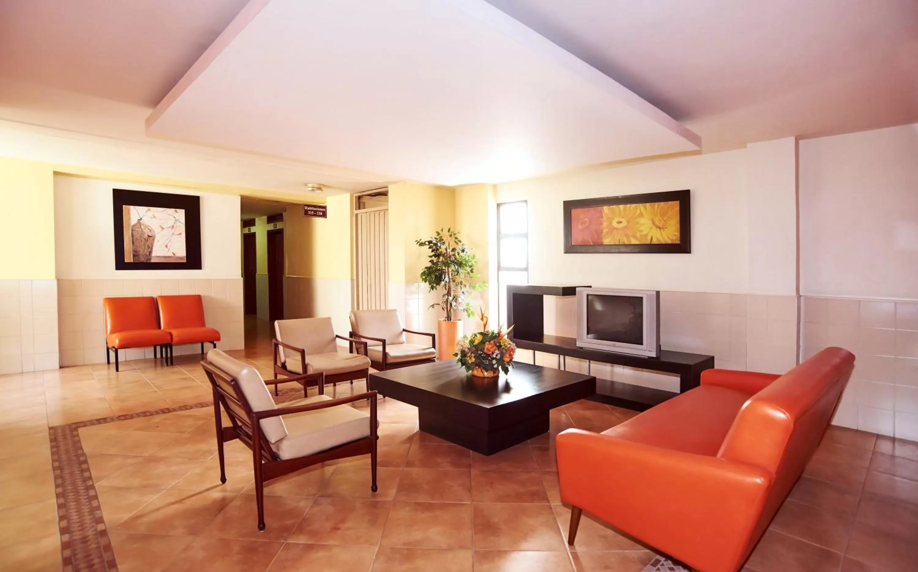 Communal lounge/ TV room, Seating Area in Mar Hotel