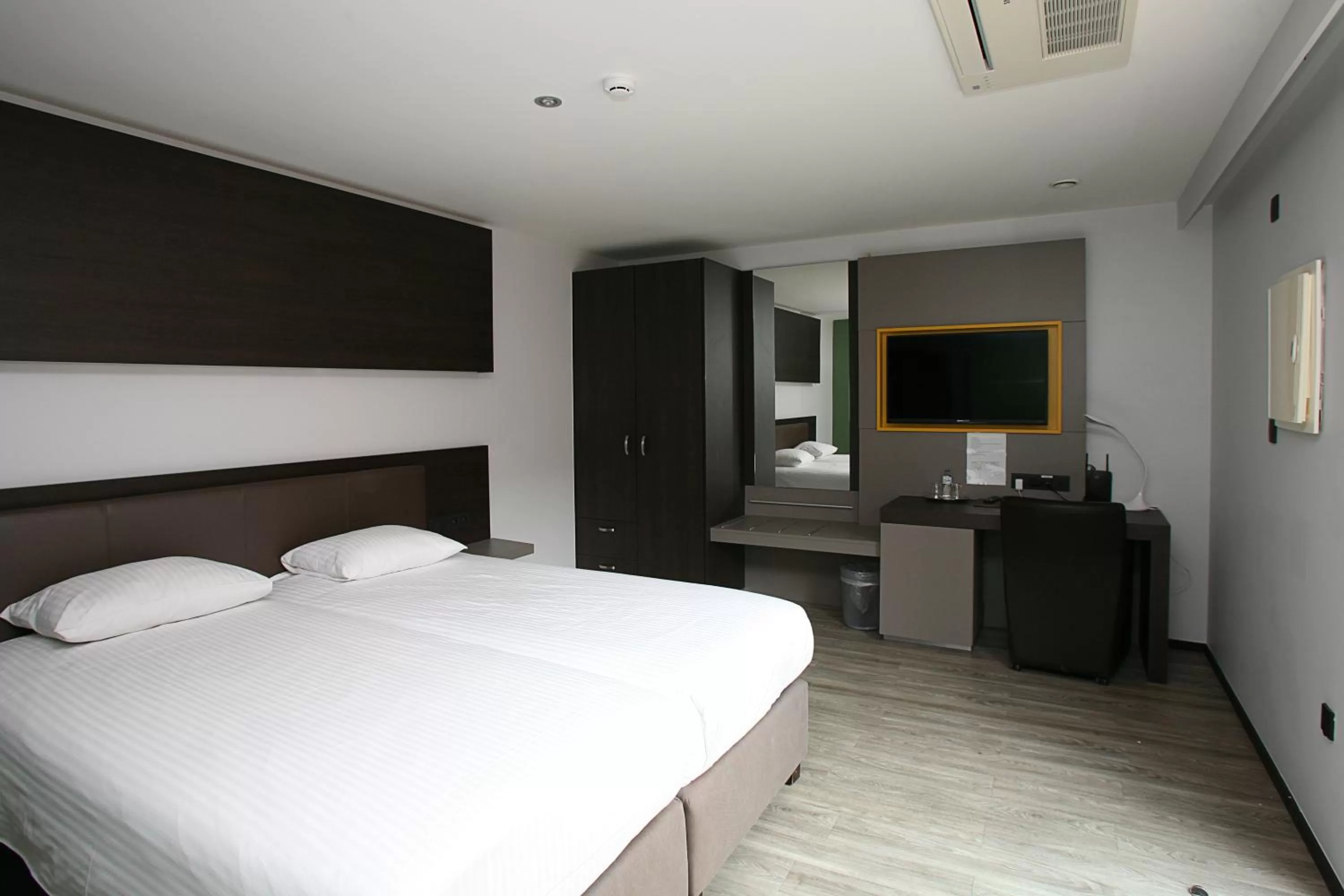 Bed in Hotel Au Prince Royal