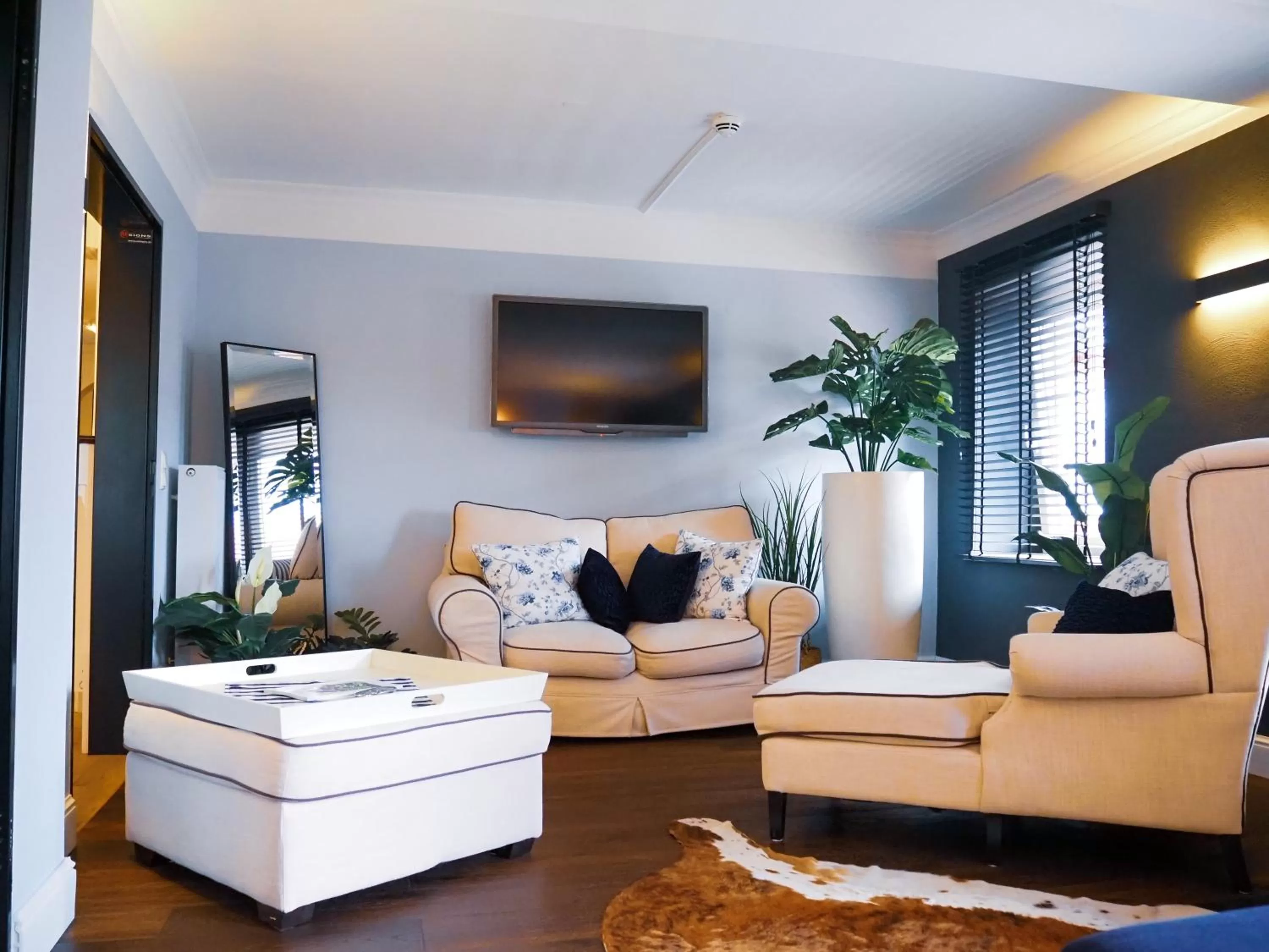 Living room, Seating Area in Sauna & Whirlpool - ALPENLIEBE APARTments