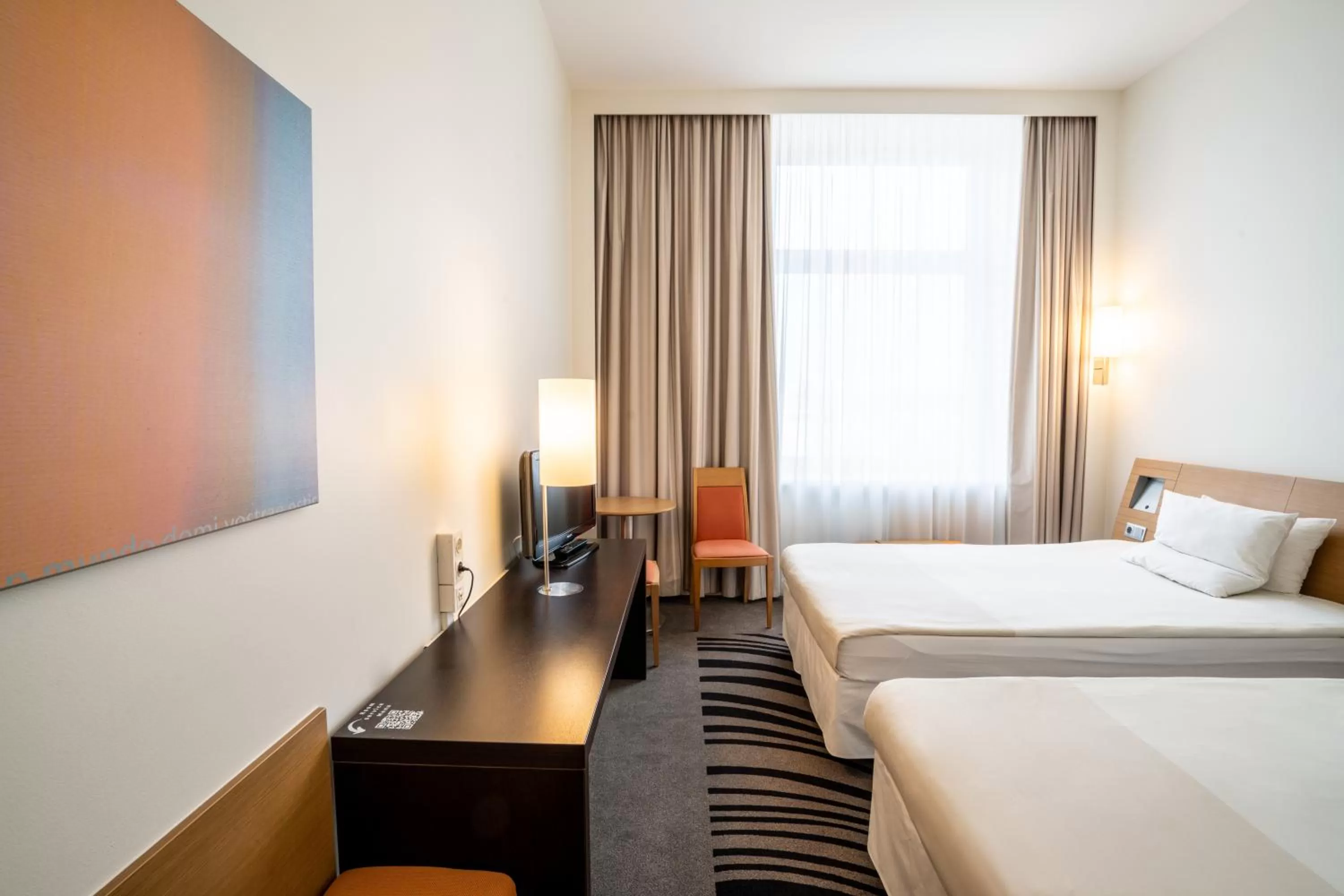 Property building, Bed in Novotel Vilnius Centre