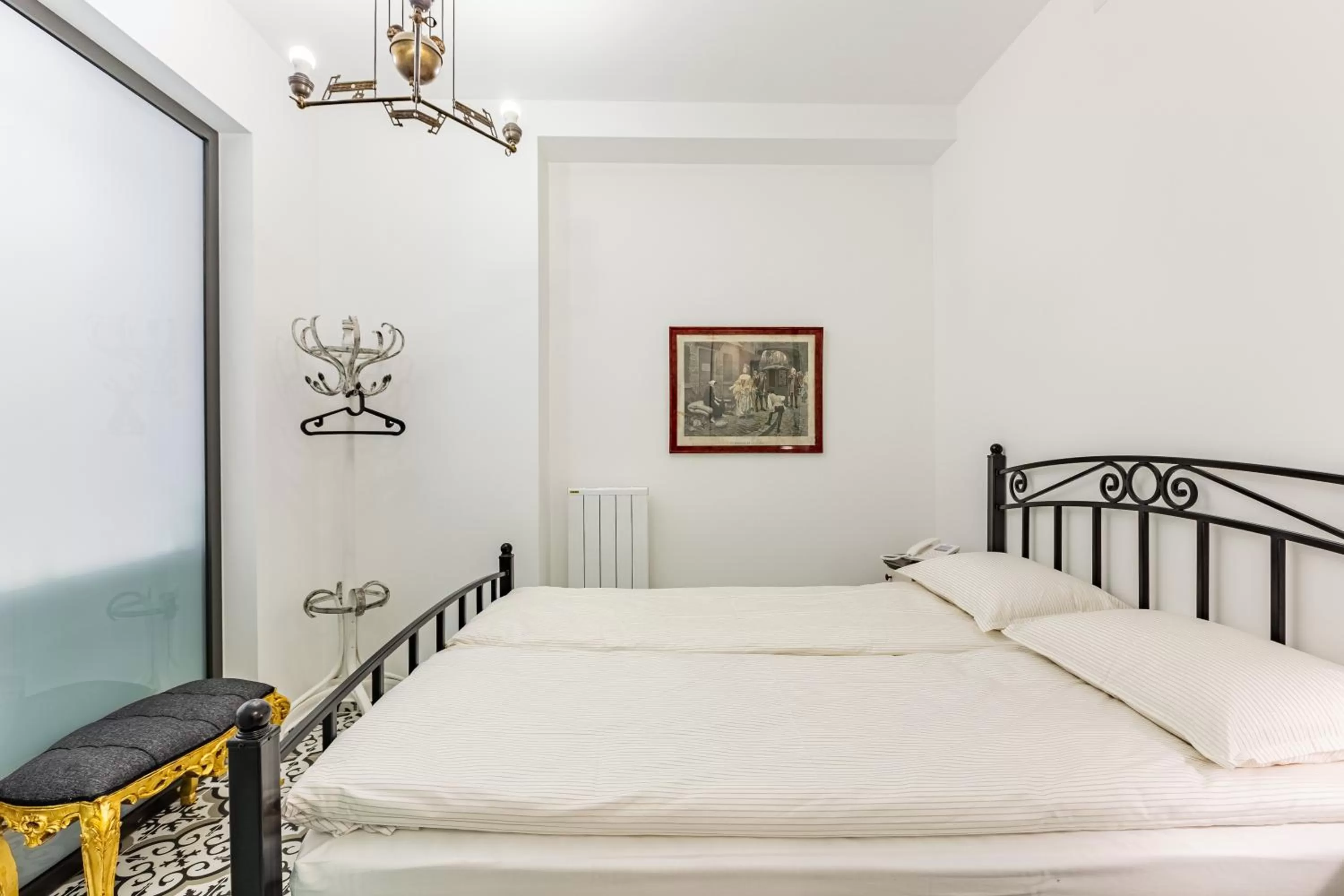 Bed in Villa Pera Suite Hotel