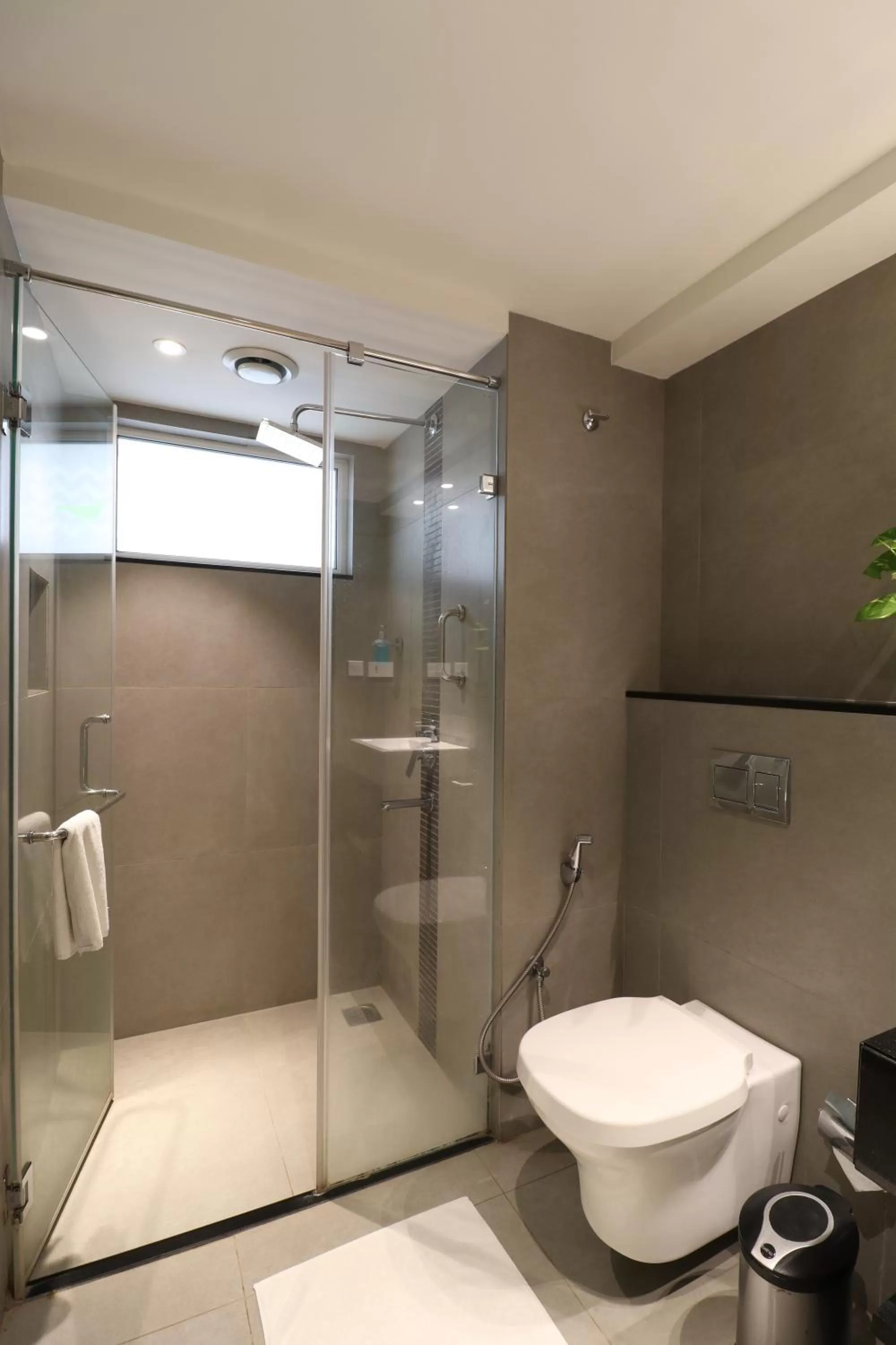 Bathroom in ZIBE Salem By GRT Hotels