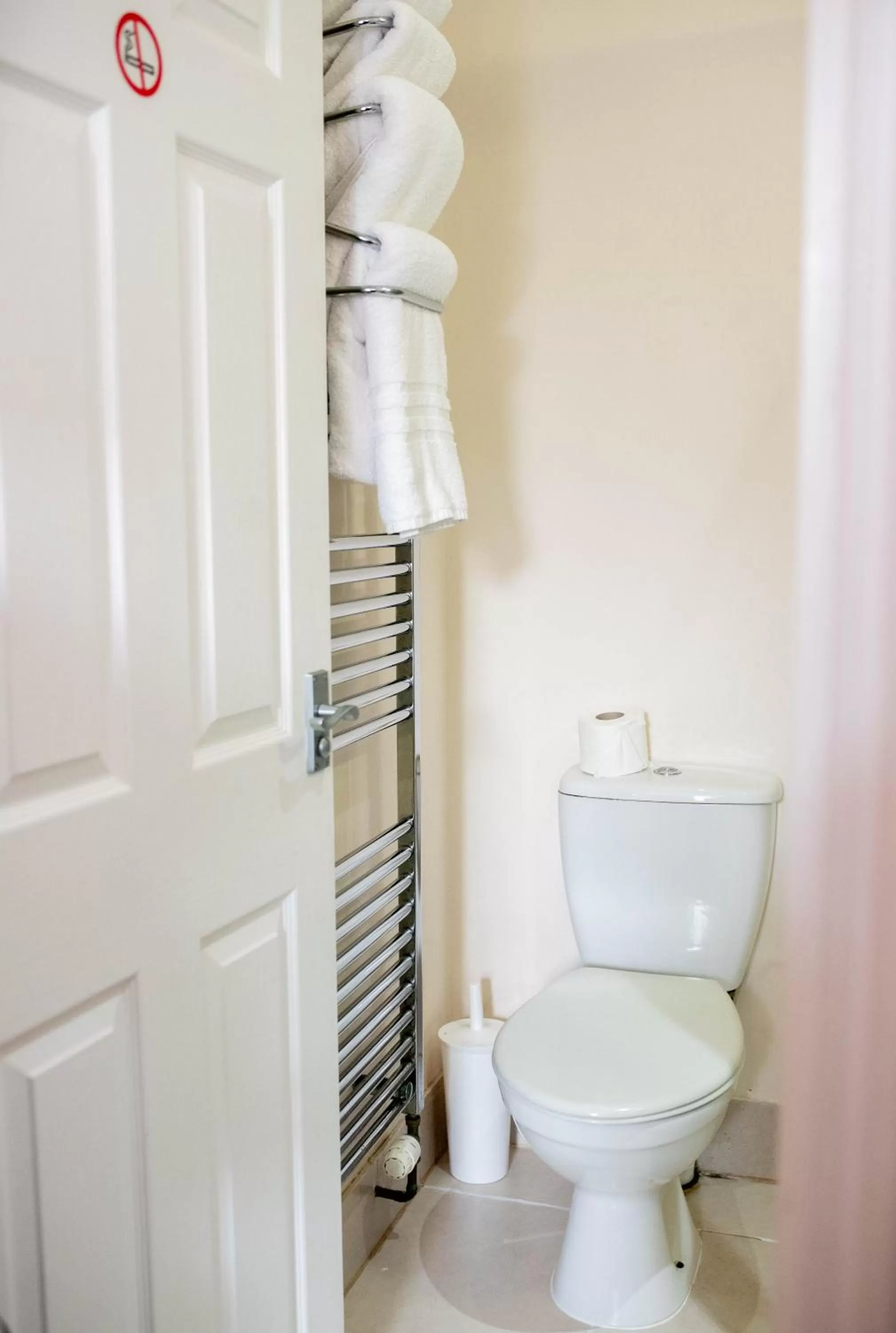 Toilet in Revado Hotel