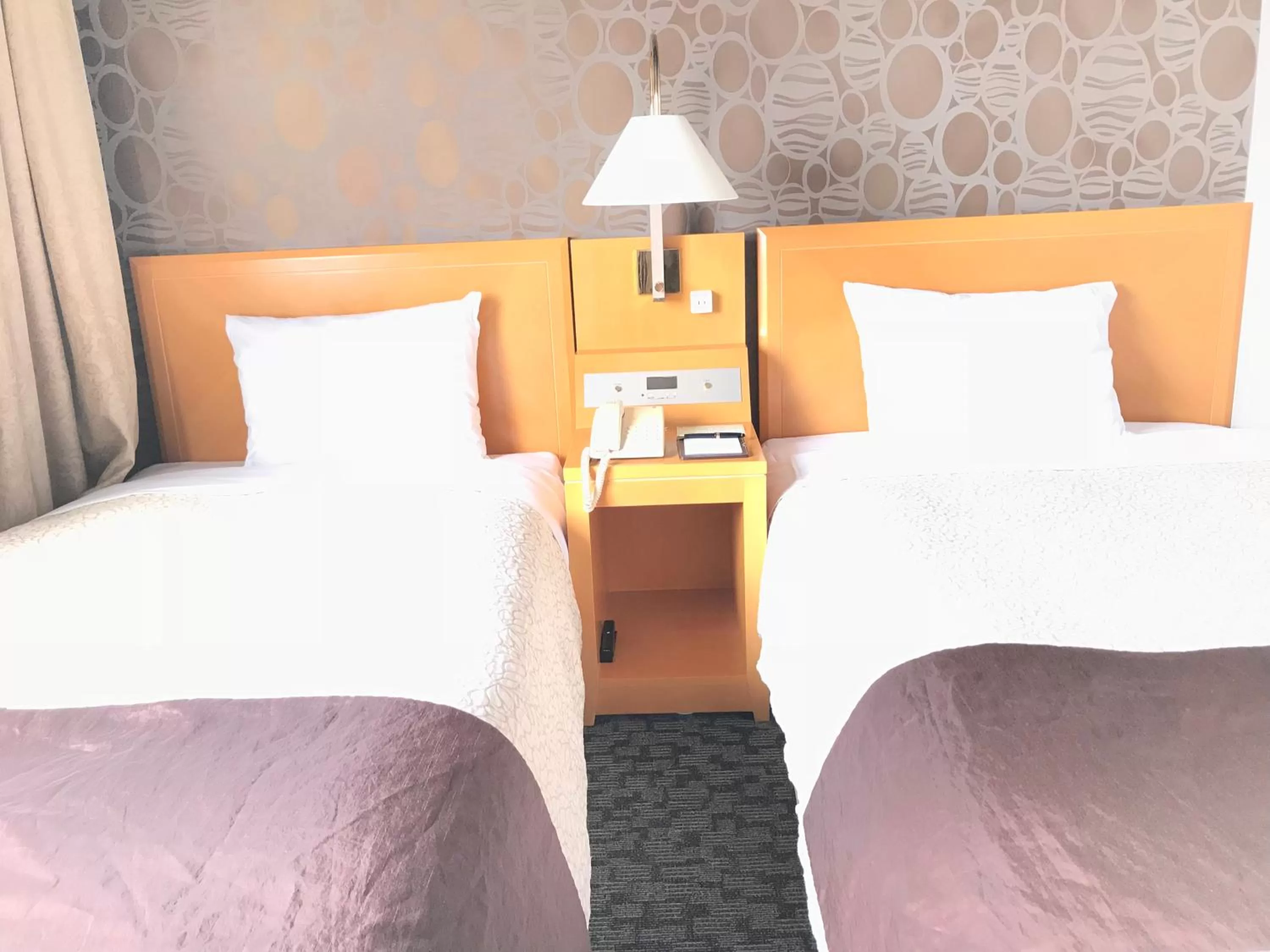 Bed in Numazu River Side Hotel