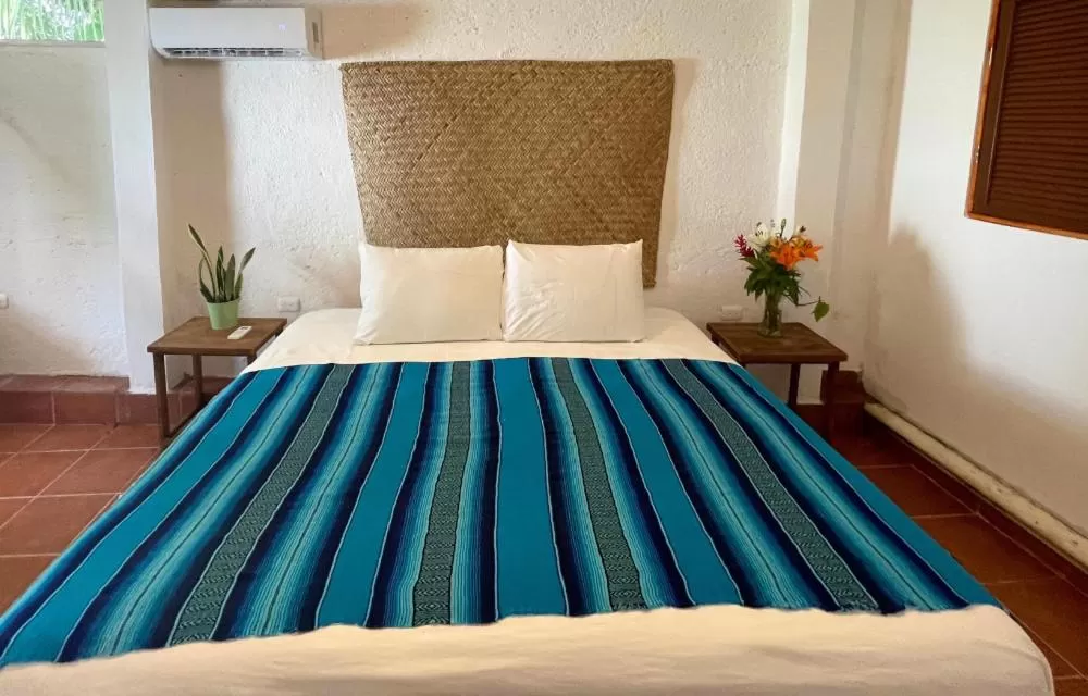Bed in Hotel Villas Colibrí Suites & Bungalows