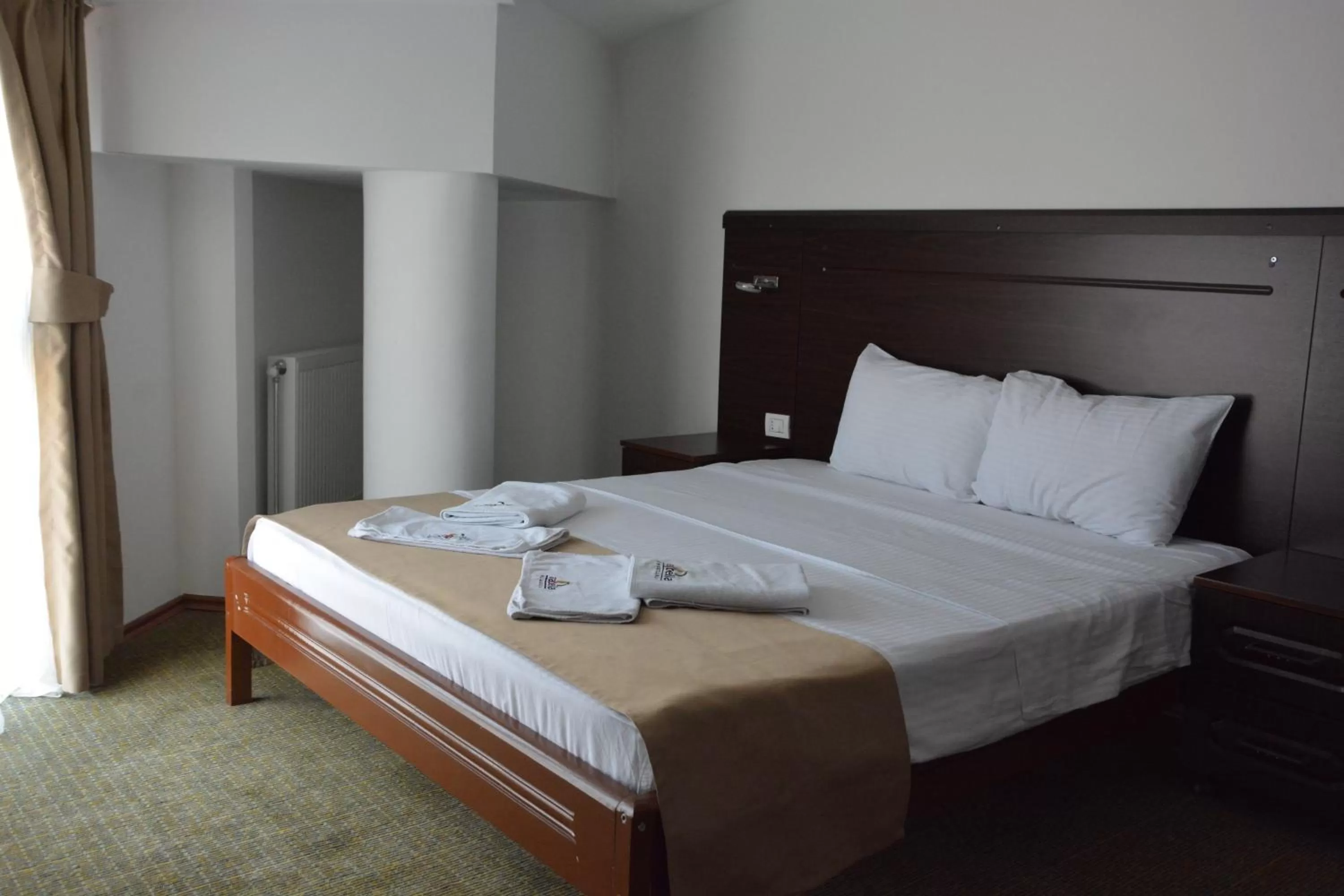 Bed in Arabella Hotel